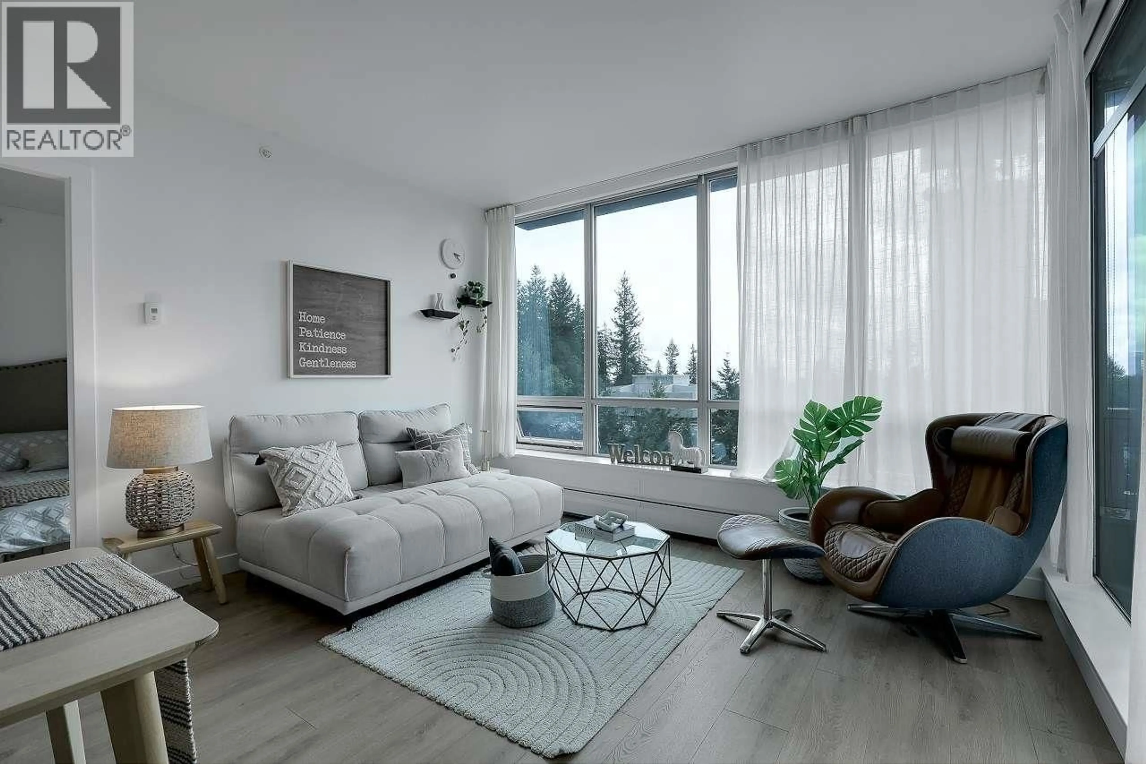 Living room with furniture, unknown for 803 - 9060 UNIVERSITY CRESCENT, Burnaby British Columbia V5A0E1
