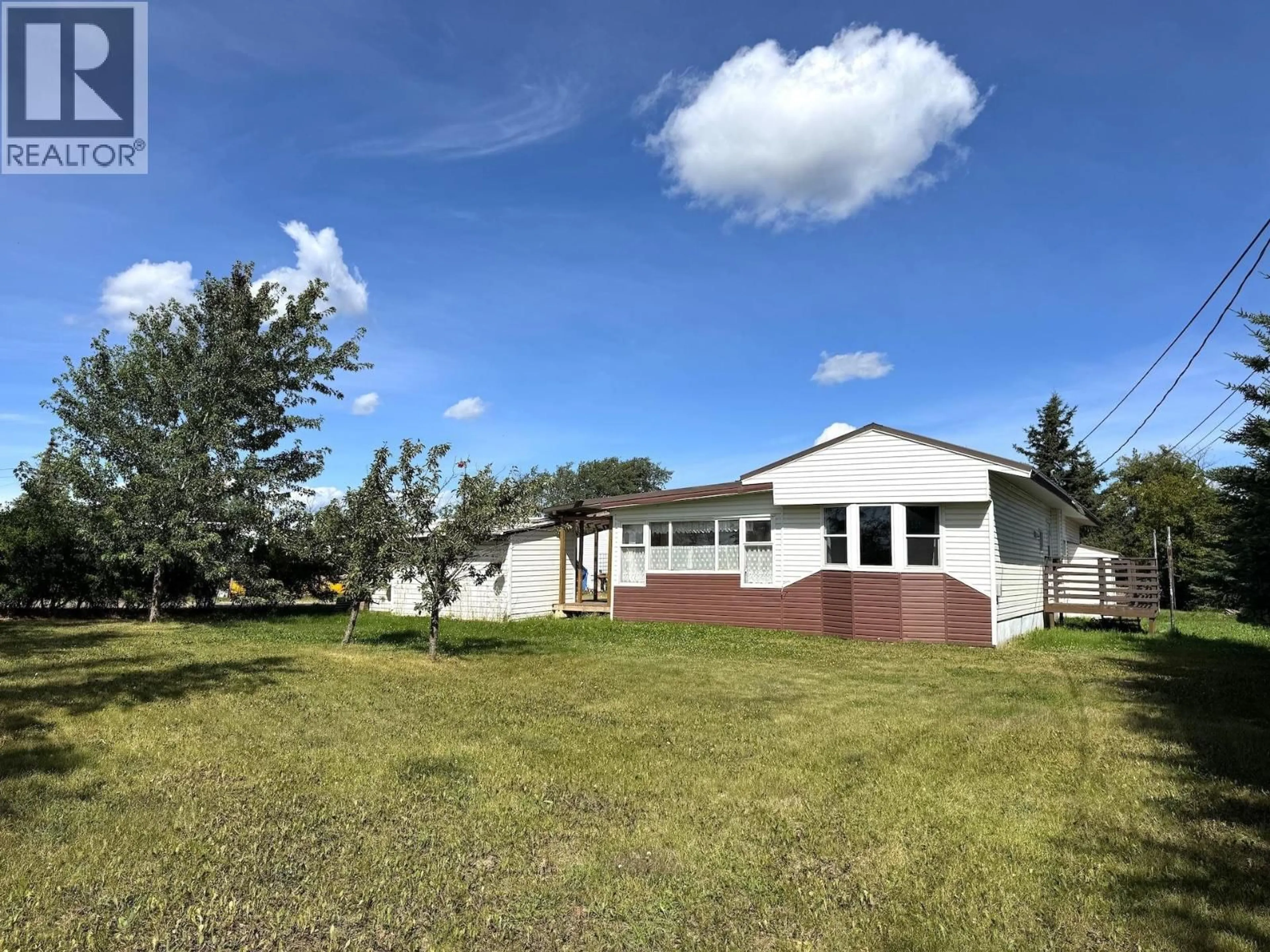 A pic from outside/outdoor area/front of a property/back of a property/a pic from drone, unknown for 10996 POPLAR ROAD, Fort St. John British Columbia V1J8E5
