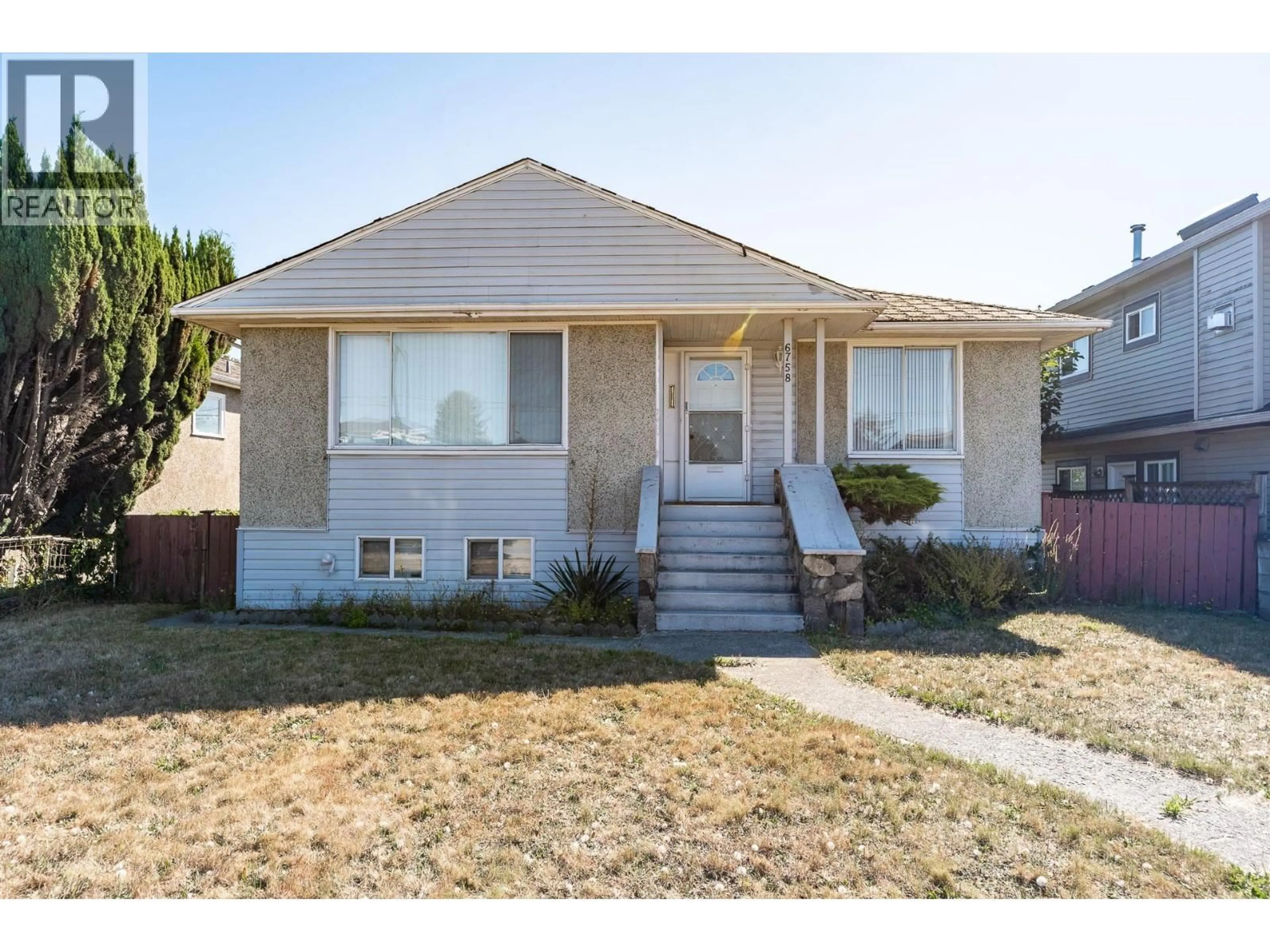 Home with vinyl exterior material, street for 6758 VICTORIA DRIVE, Vancouver British Columbia V5P3Y3