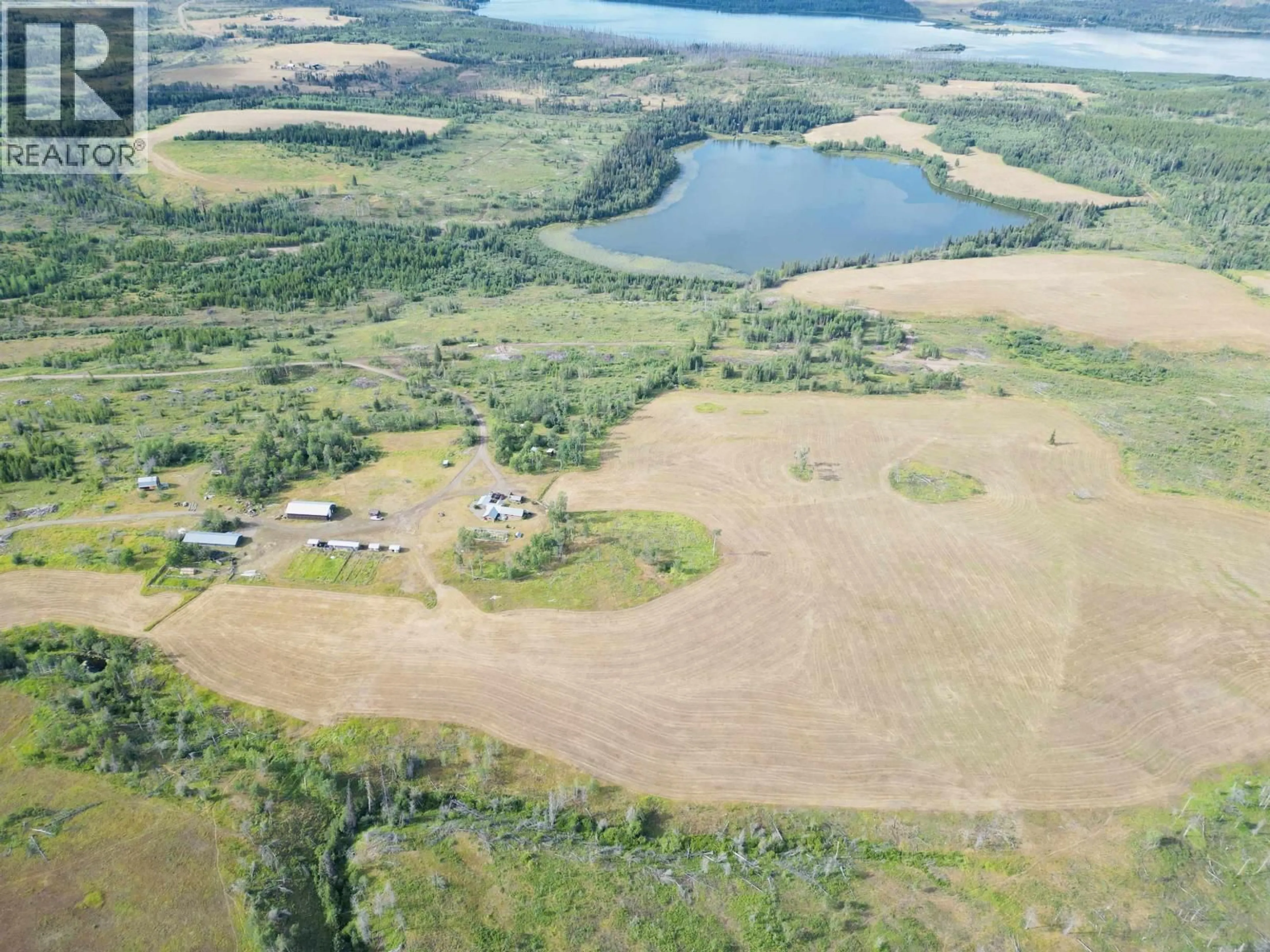 A pic from outside/outdoor area/front of a property/back of a property/a pic from drone, water/lake/river/ocean view for 42044 EAKIN SETTLEMENT ROAD, Burns Lake British Columbia V0J1E4