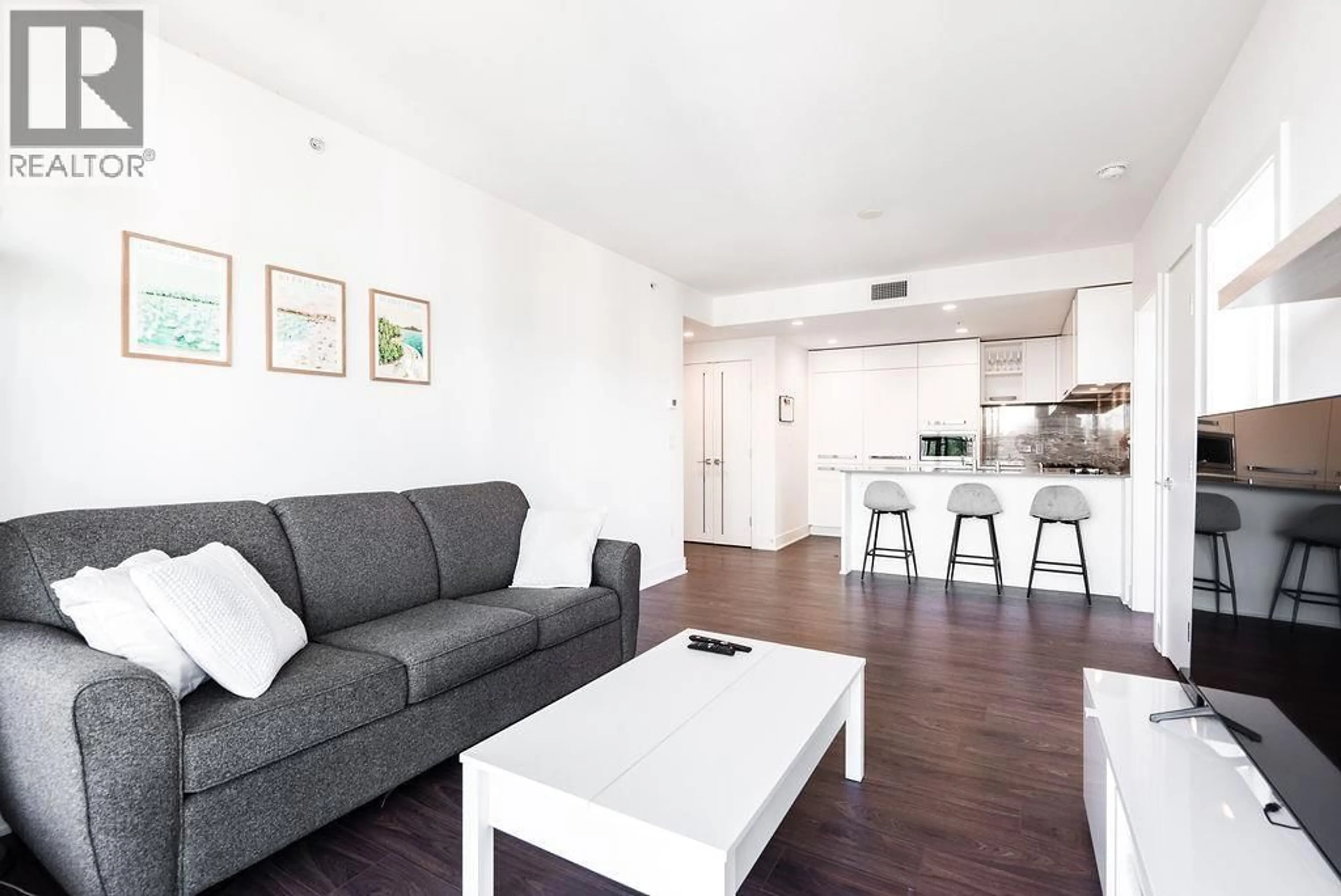 Living room with furniture, wood/laminate floor for 2002 - 450 WESTVIEW STREET, Coquitlam British Columbia V3K0G3