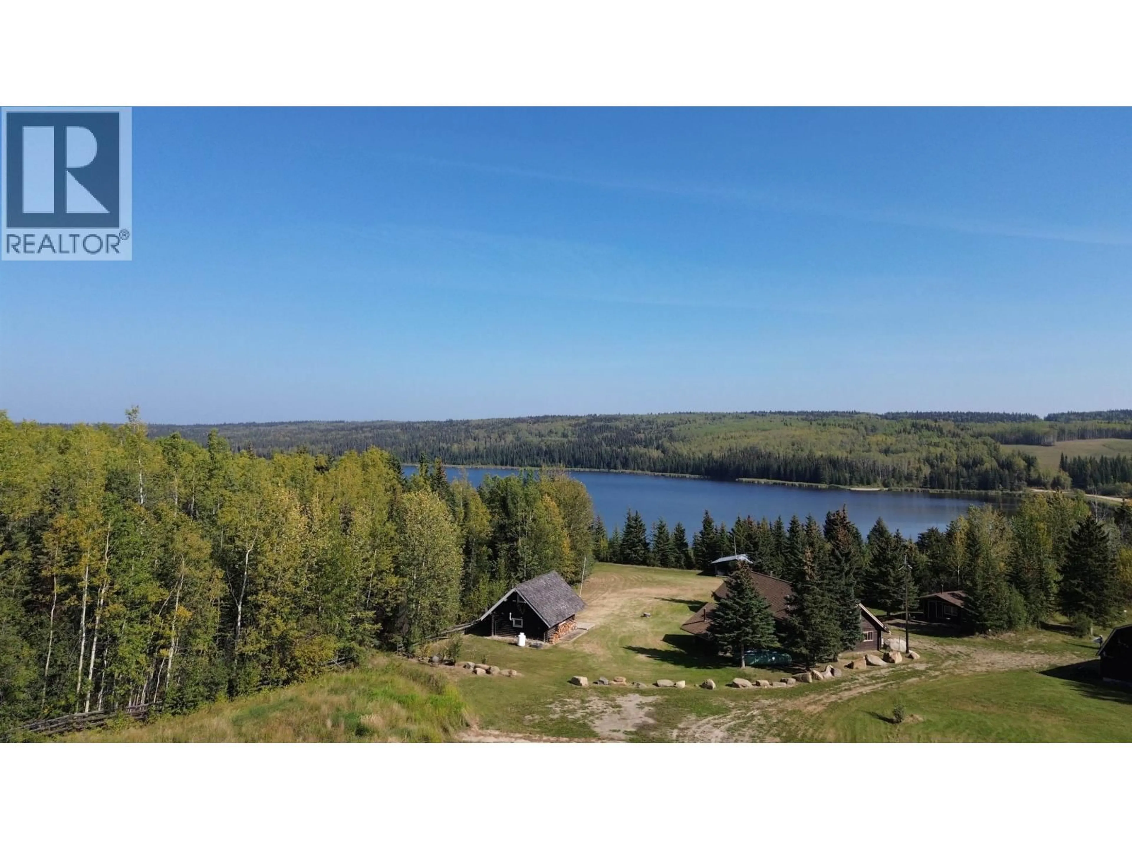 A pic from outside/outdoor area/front of a property/back of a property/a pic from drone, water/lake/river/ocean view for 17530 INGA LAKE ROAD, Fort St. John British Columbia V0C1Y0