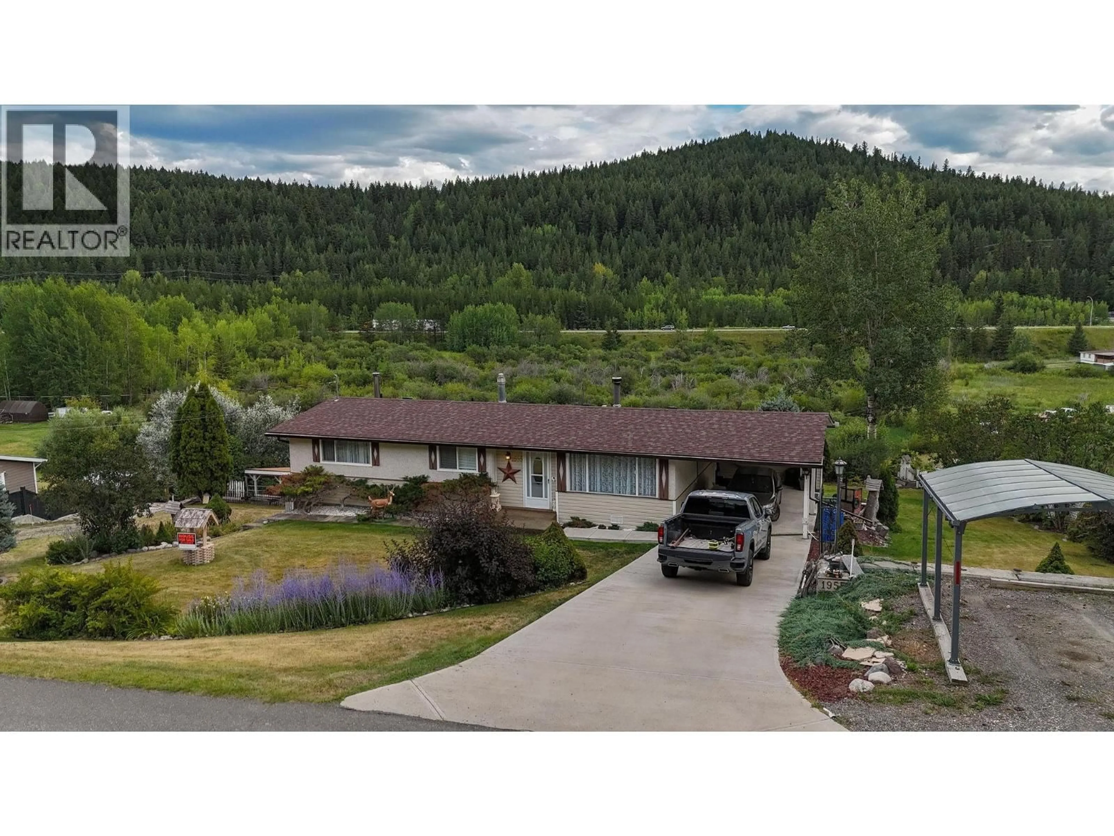 A pic from outside/outdoor area/front of a property/back of a property/a pic from drone, mountain view for 1955 COMMODORE CRESCENT, Williams Lake British Columbia V2G5K4