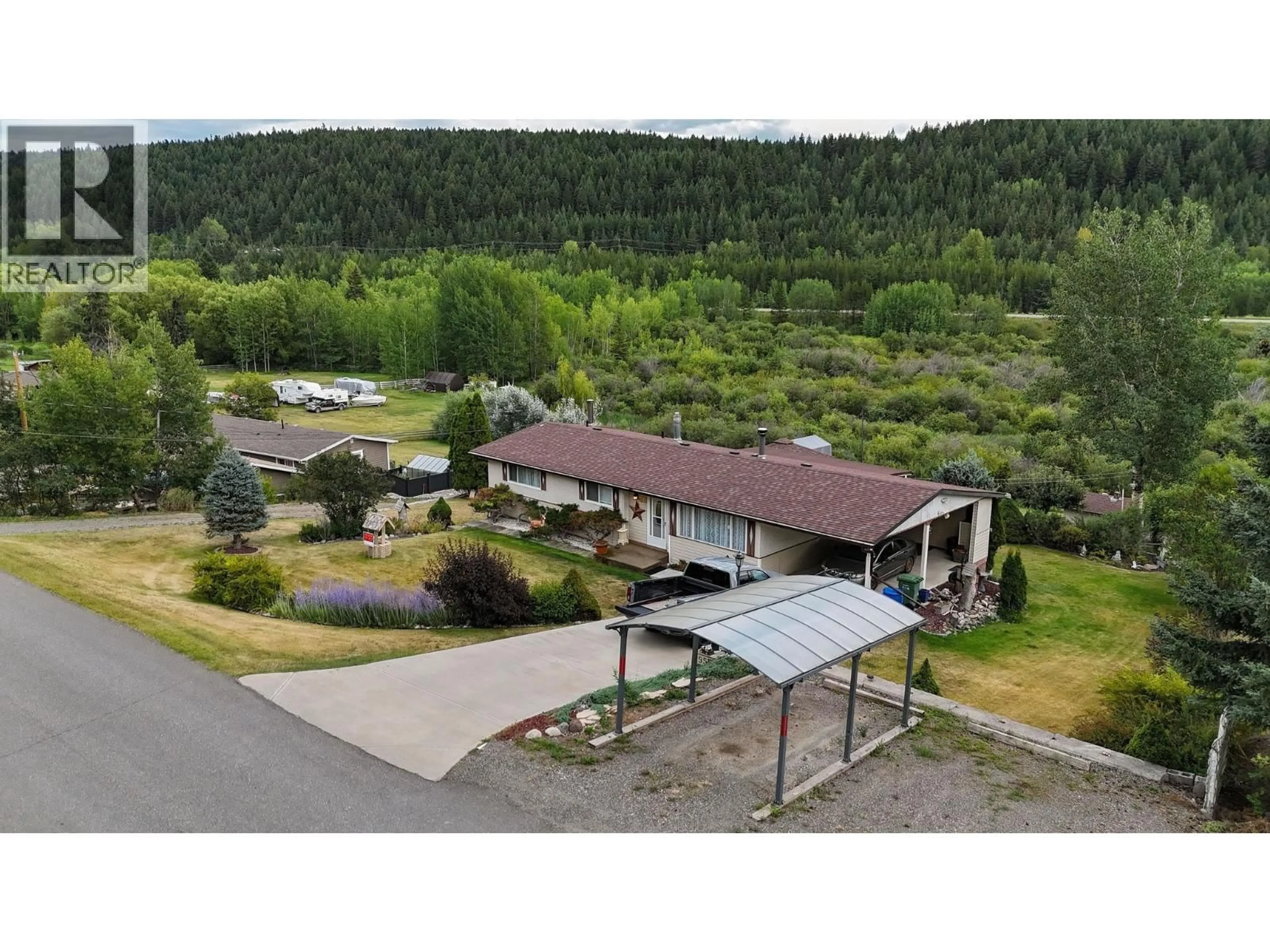 A pic from outside/outdoor area/front of a property/back of a property/a pic from drone, mountain view for 1955 COMMODORE CRESCENT, Williams Lake British Columbia V2G5K4