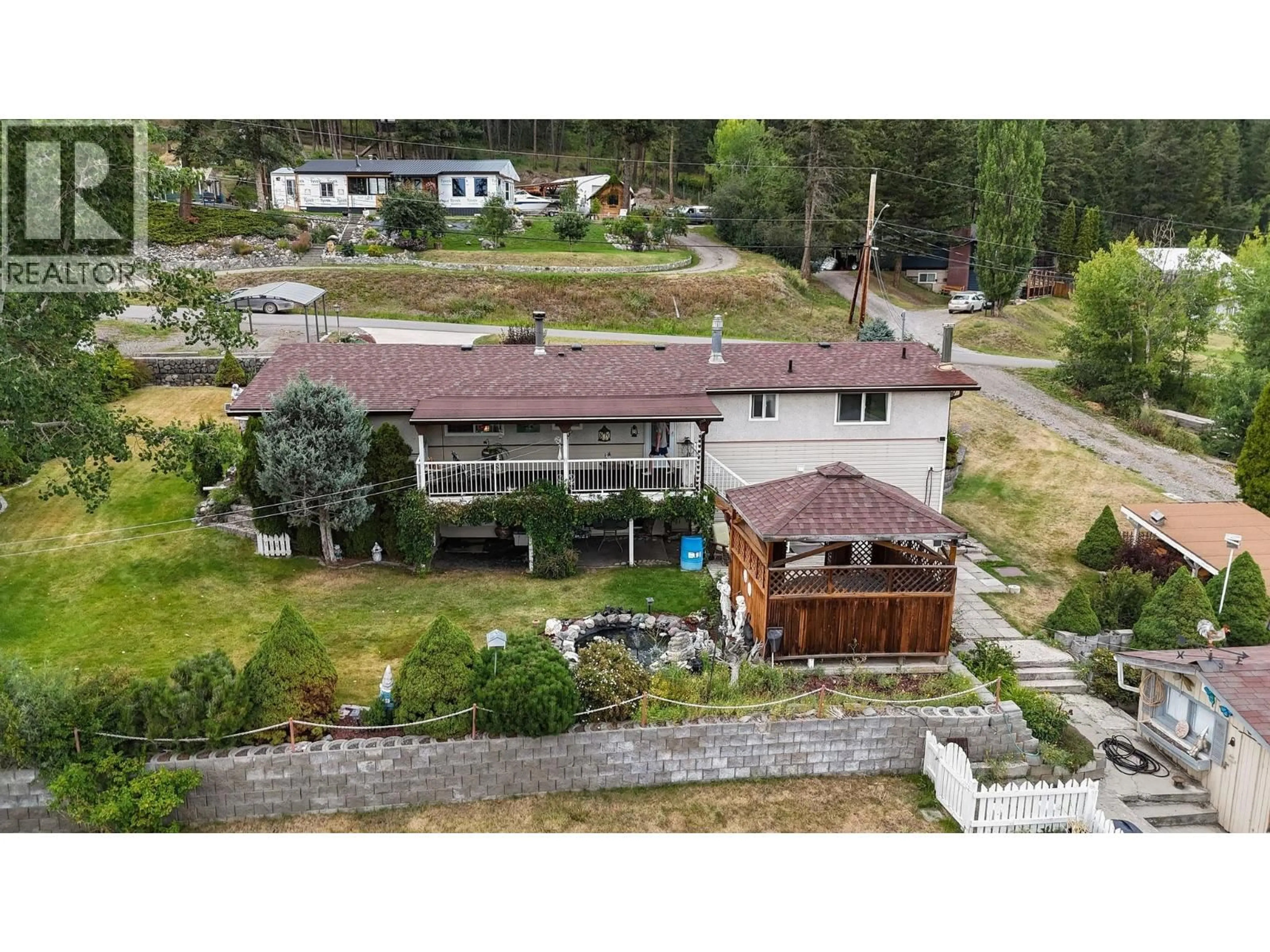 A pic from outside/outdoor area/front of a property/back of a property/a pic from drone, mountain view for 1955 COMMODORE CRESCENT, Williams Lake British Columbia V2G5K4