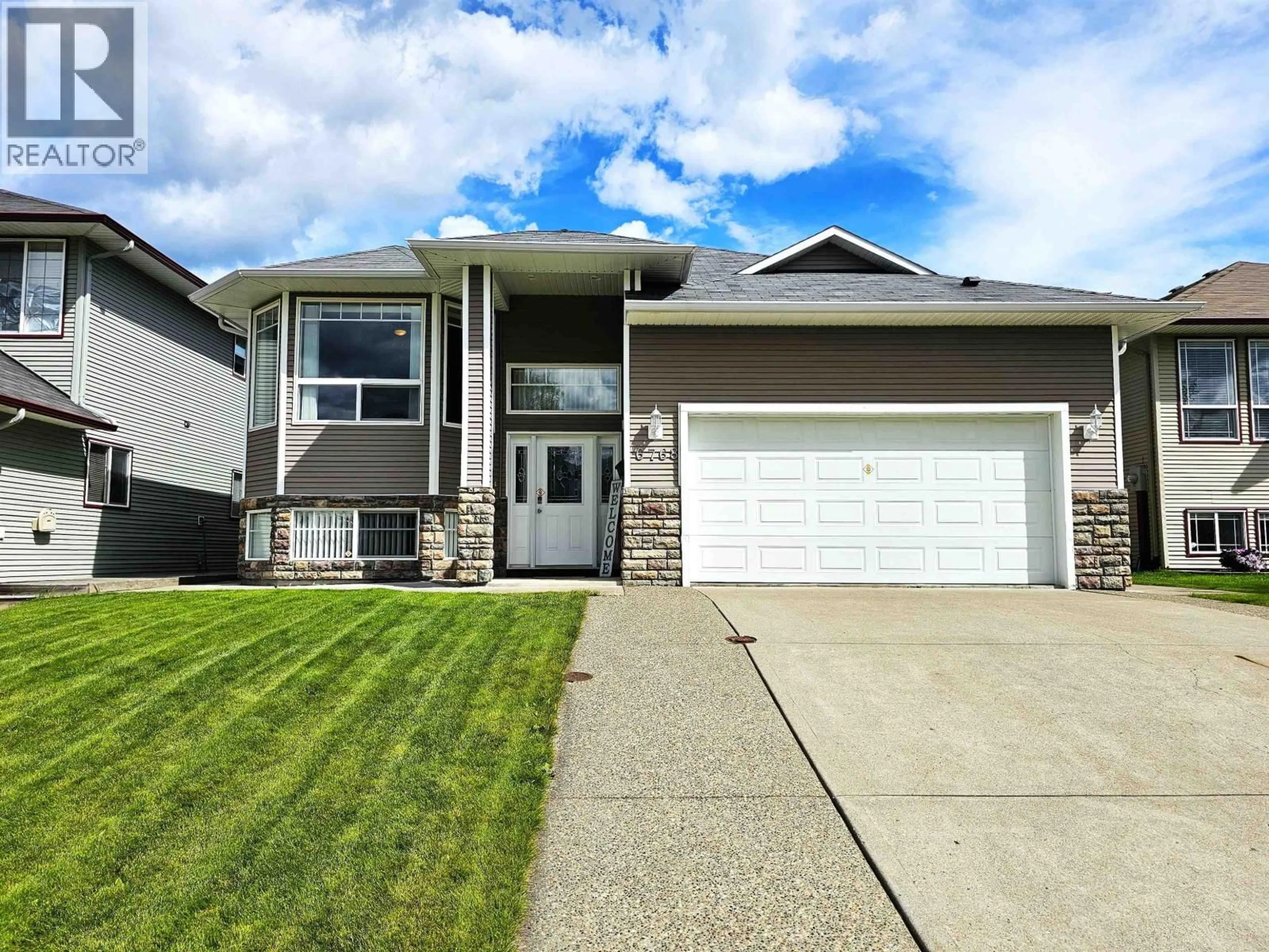 Home with vinyl exterior material, street for 6768 CHARTWELL CRESCENT, Prince George British Columbia V2N6Y3