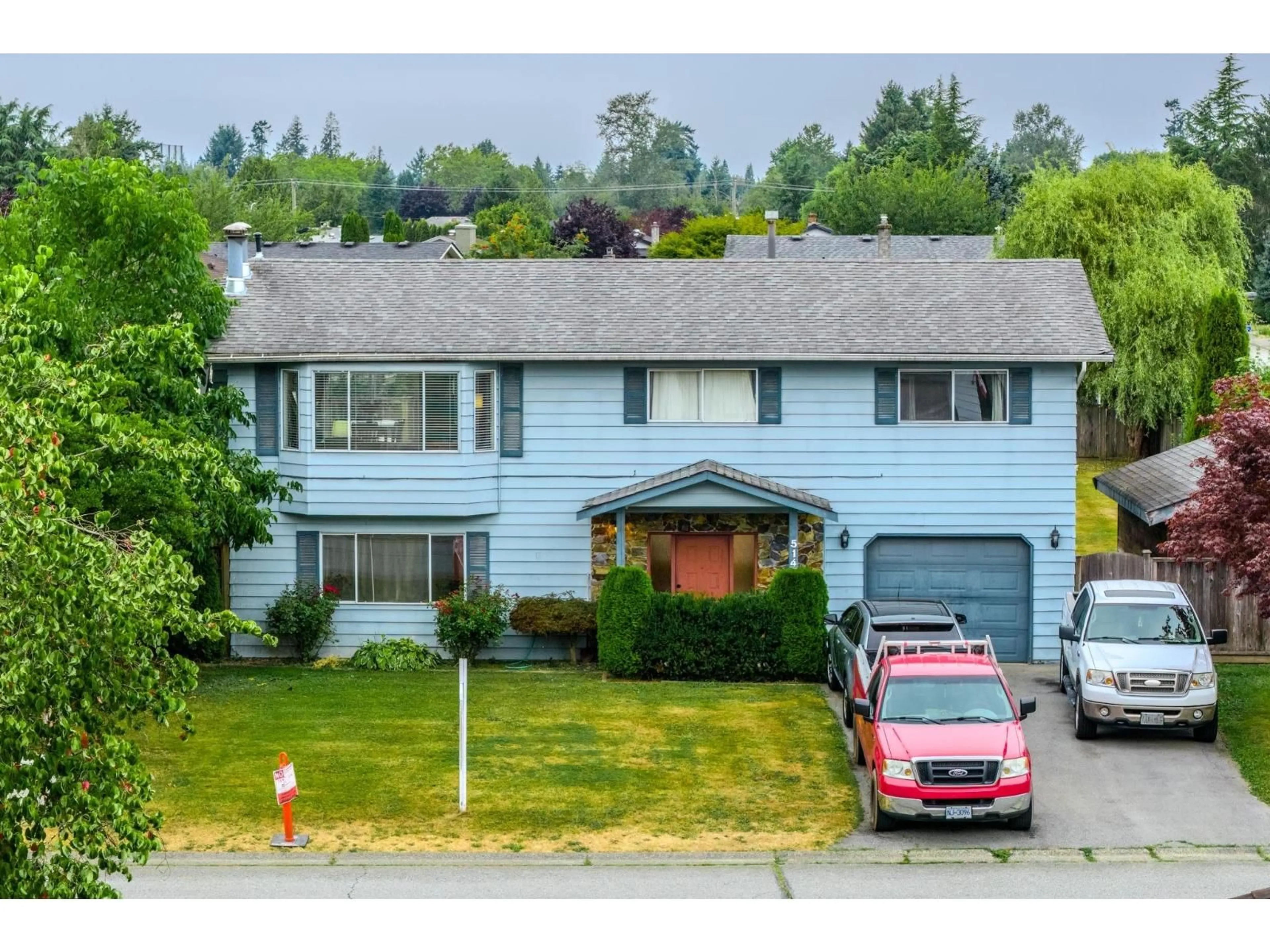 A pic from outside/outdoor area/front of a property/back of a property/a pic from drone, street for 5149 209A, Langley British Columbia V3A7M6