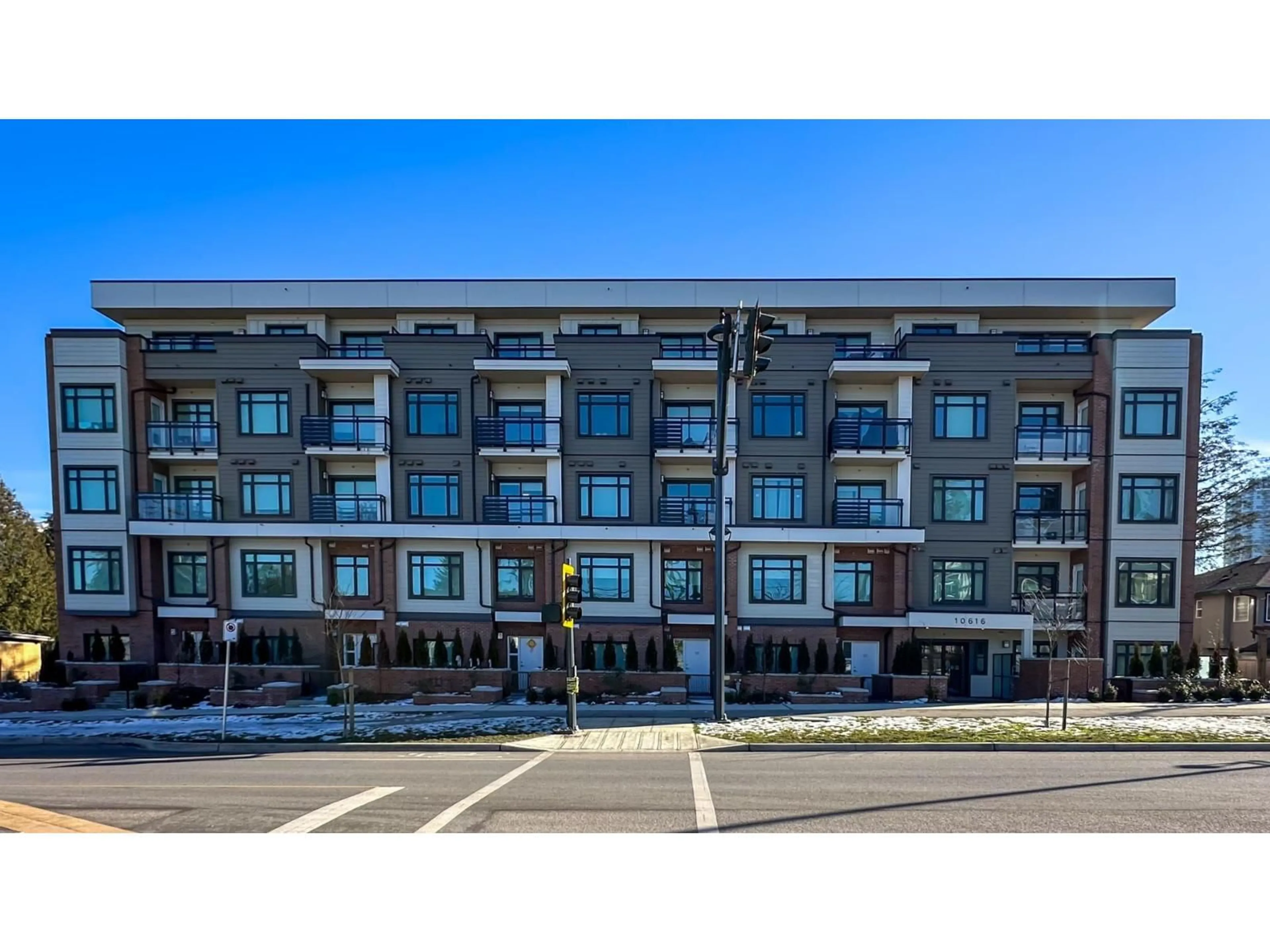 A pic from outside/outdoor area/front of a property/back of a property/a pic from drone, building for 301 - 10616 132, Surrey British Columbia V3T0T3