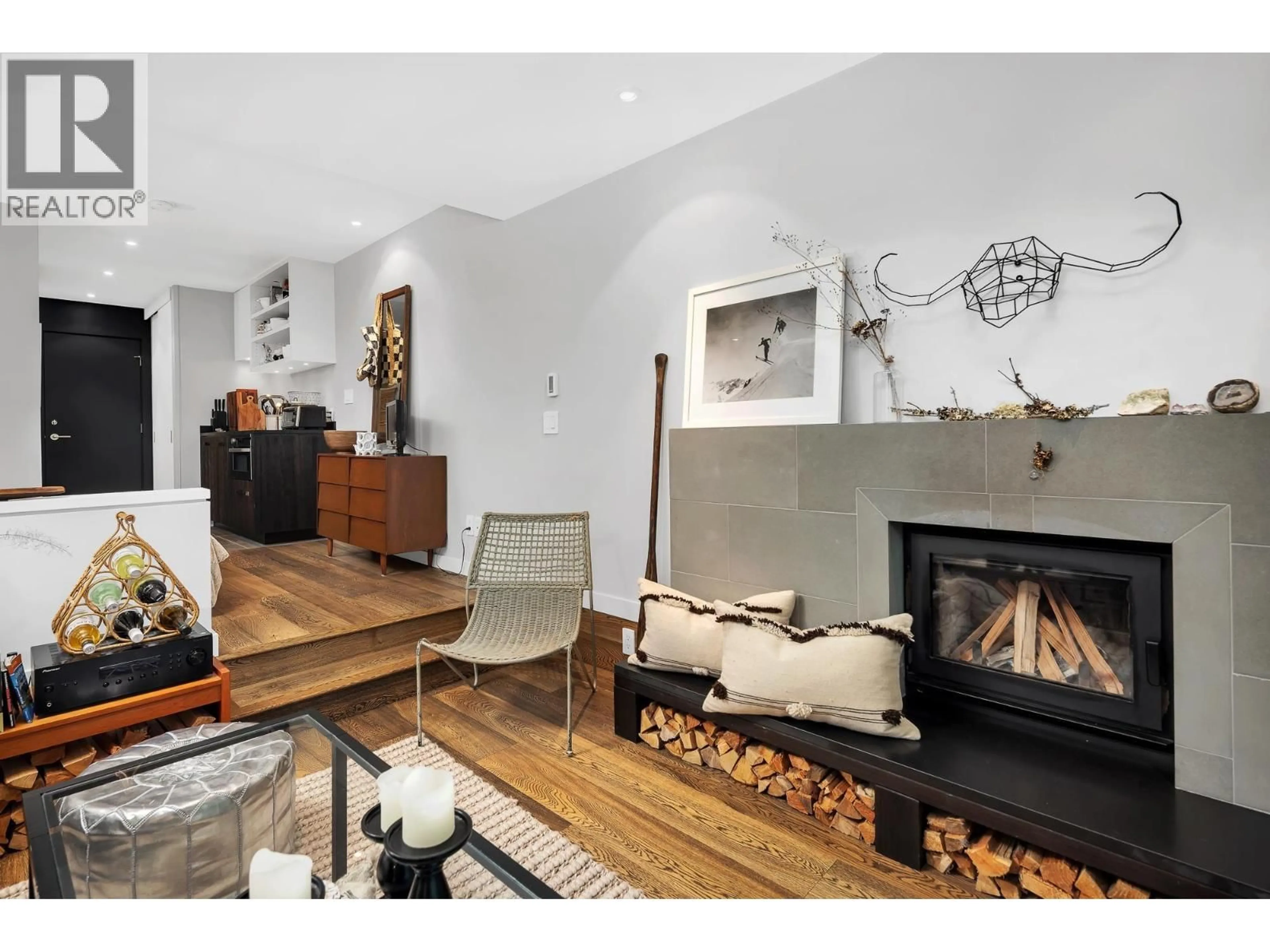 Living room with furniture, wood/laminate floor for 103 - 6850 CRABAPPLE DRIVE, Whistler British Columbia V8E0C5