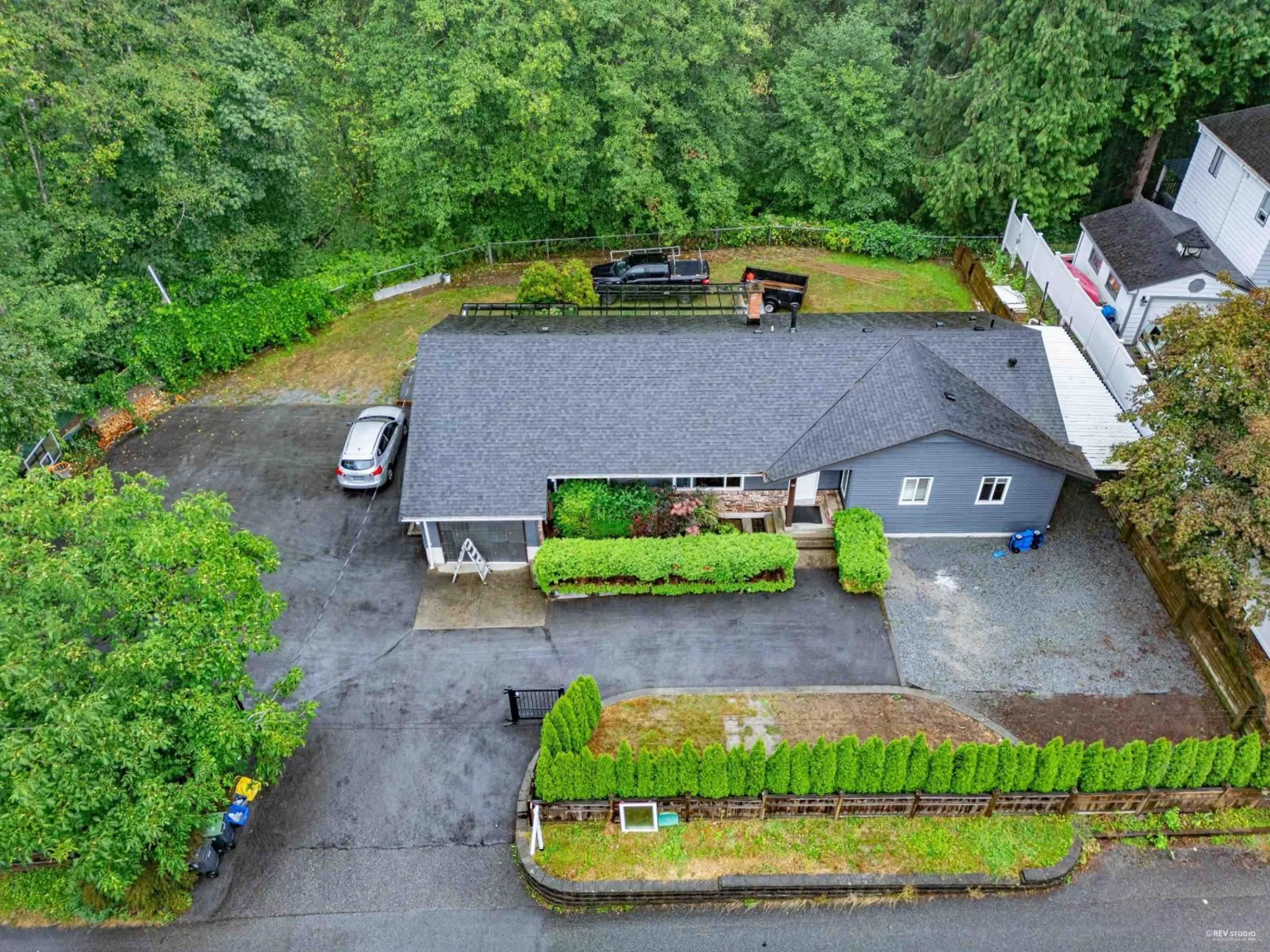 A pic from outside/outdoor area/front of a property/back of a property/a pic from drone, unknown for 9452 208, Langley British Columbia V1M2Y9