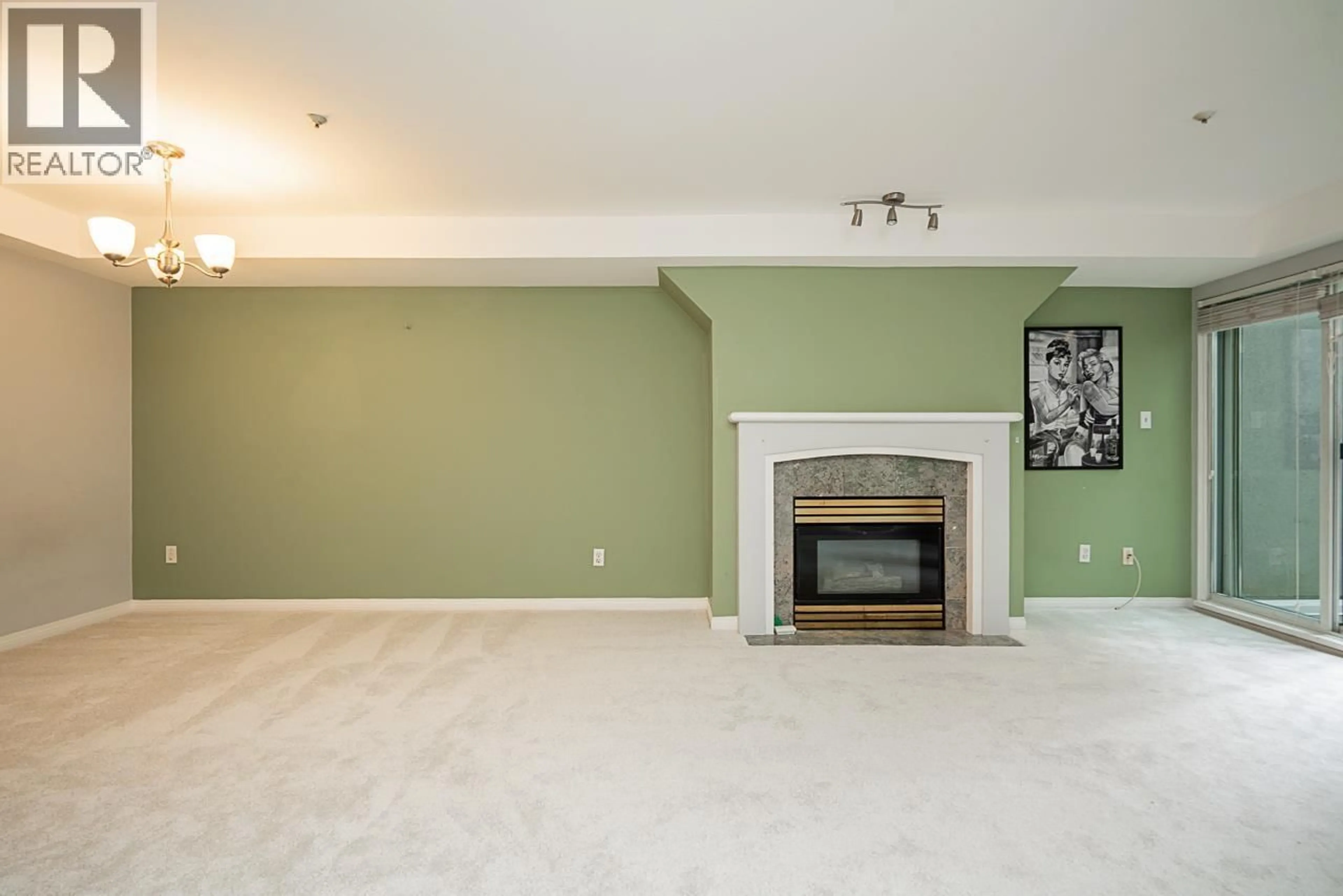 Living room with furniture, unknown for 107 - 8430 JELLICOE STREET, Vancouver British Columbia V5S4S8