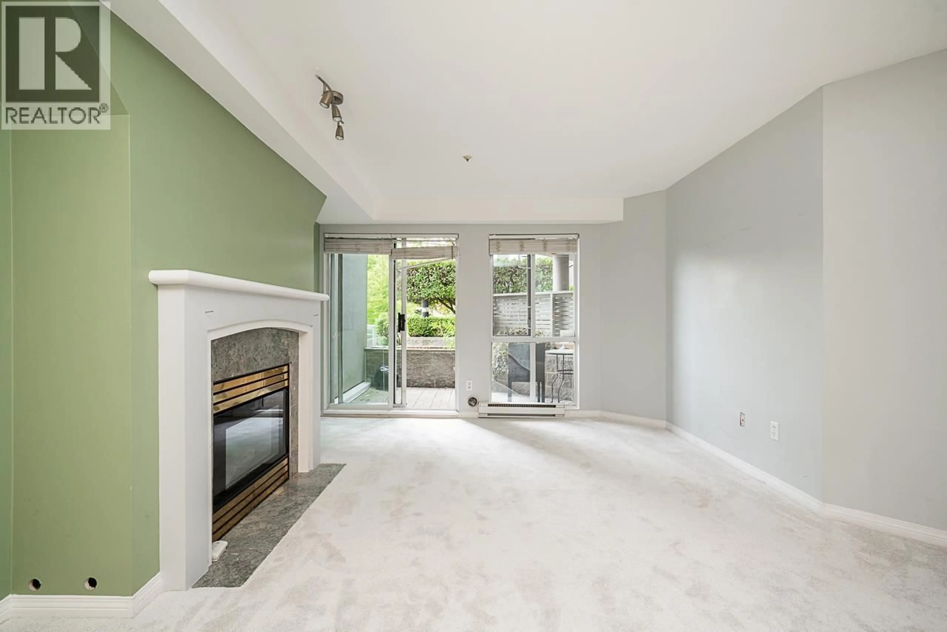 Living room with furniture, unknown for 107 - 8430 JELLICOE STREET, Vancouver British Columbia V5S4S8