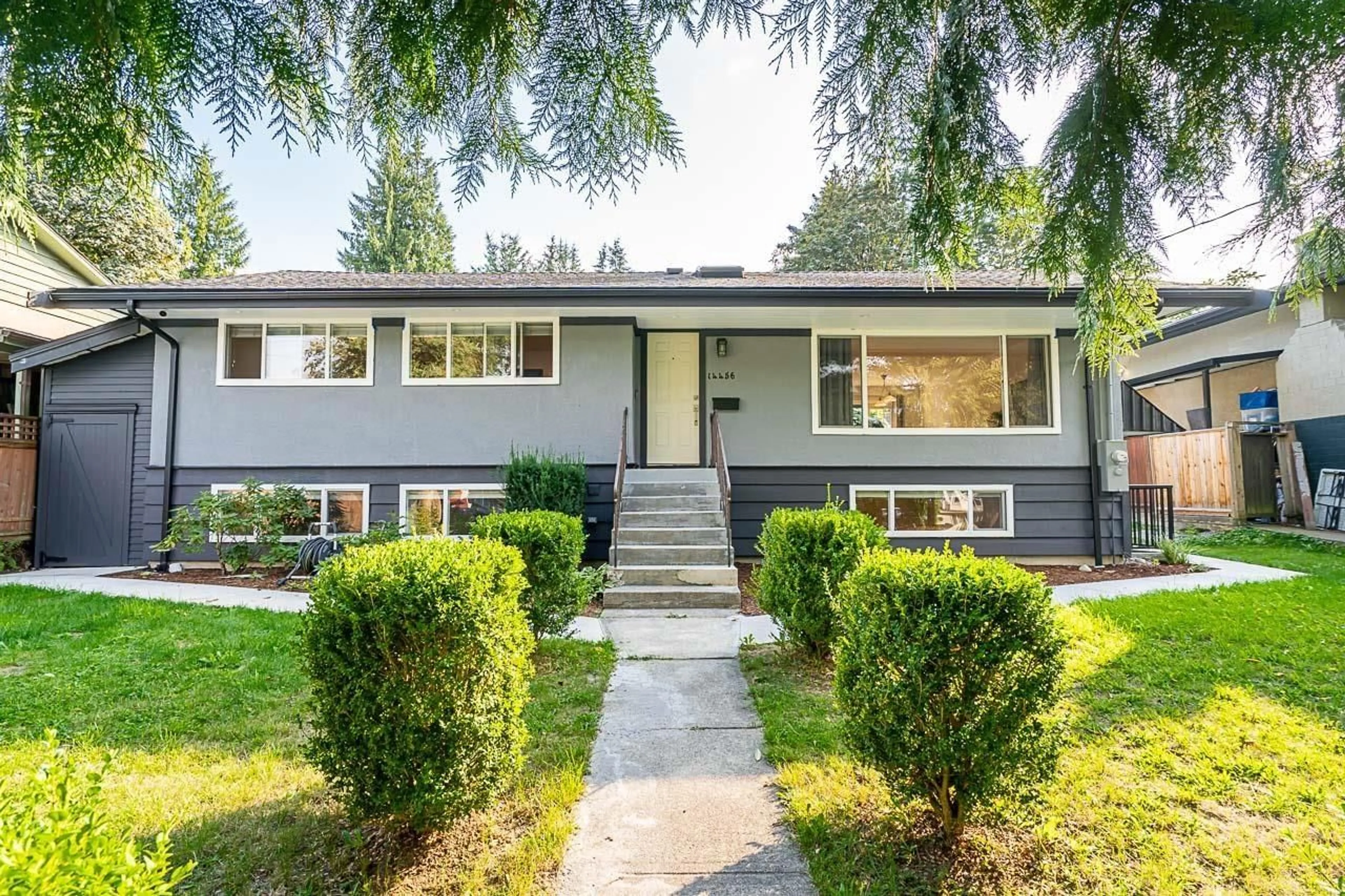 Home with vinyl exterior material, street for 14456 115, Surrey British Columbia V3R2R2