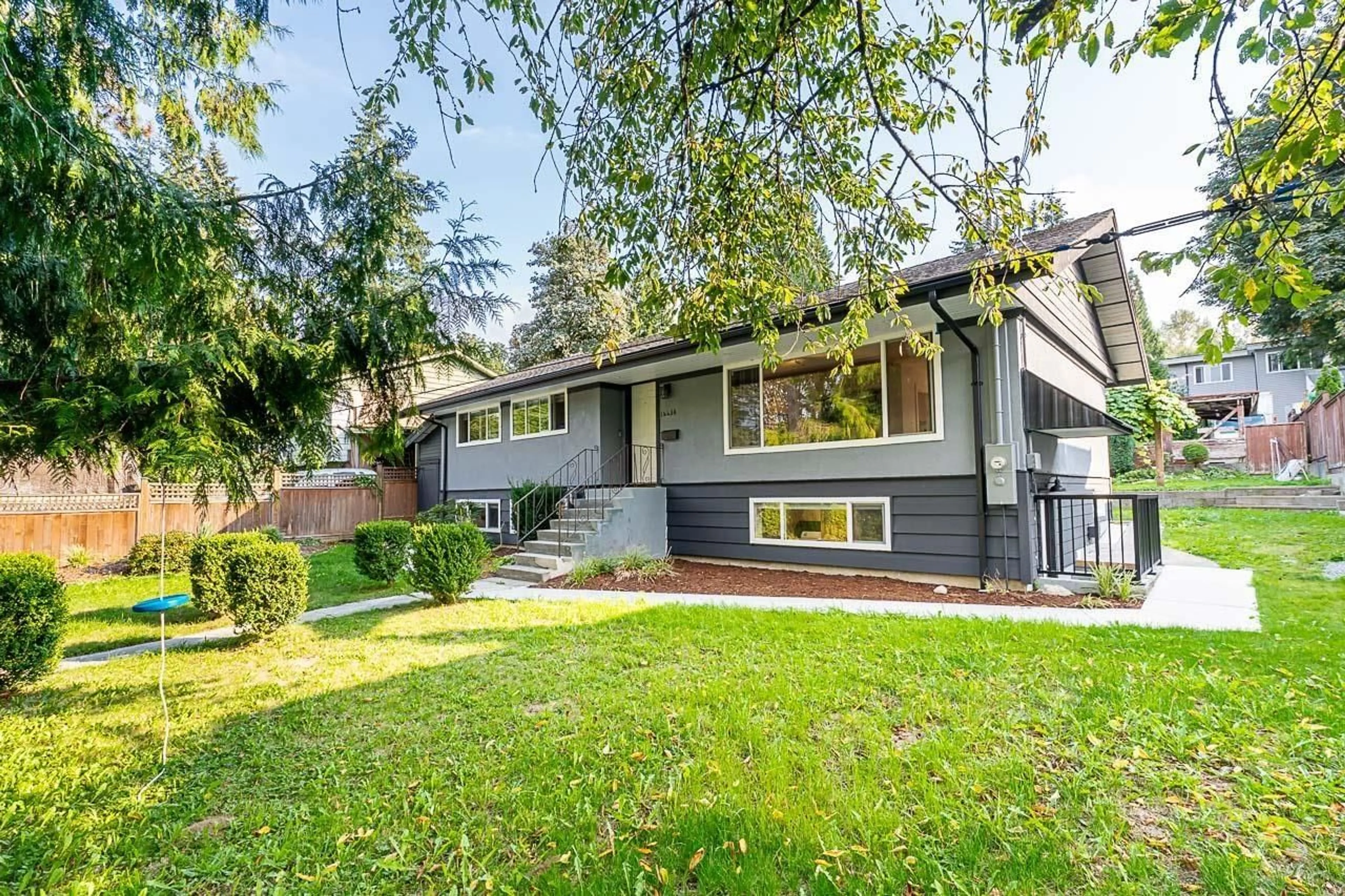 Home with vinyl exterior material, street for 14456 115, Surrey British Columbia V3R2R2