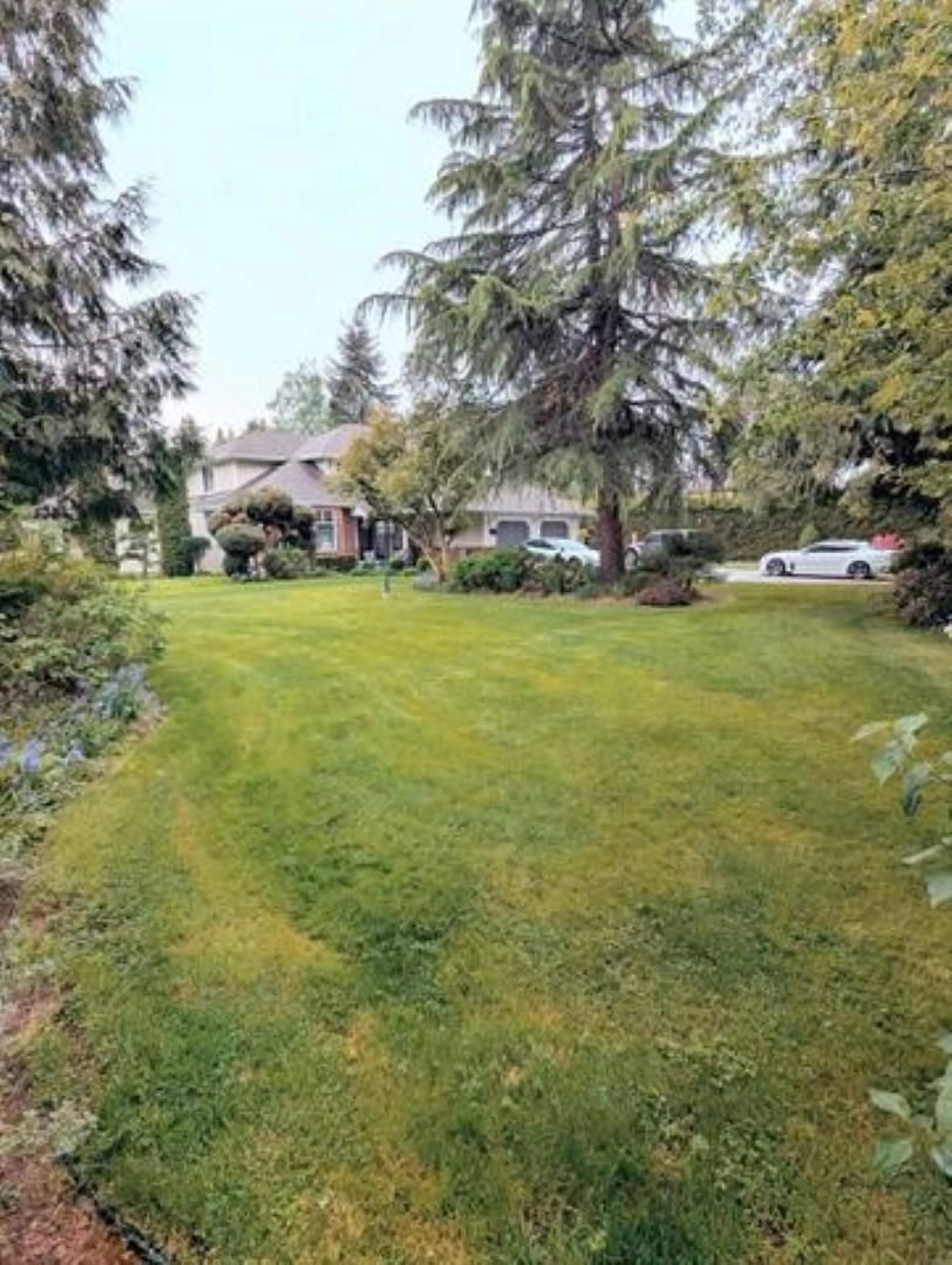 A pic from outside/outdoor area/front of a property/back of a property/a pic from drone, unknown for 25072 58, Langley British Columbia V4W1T5