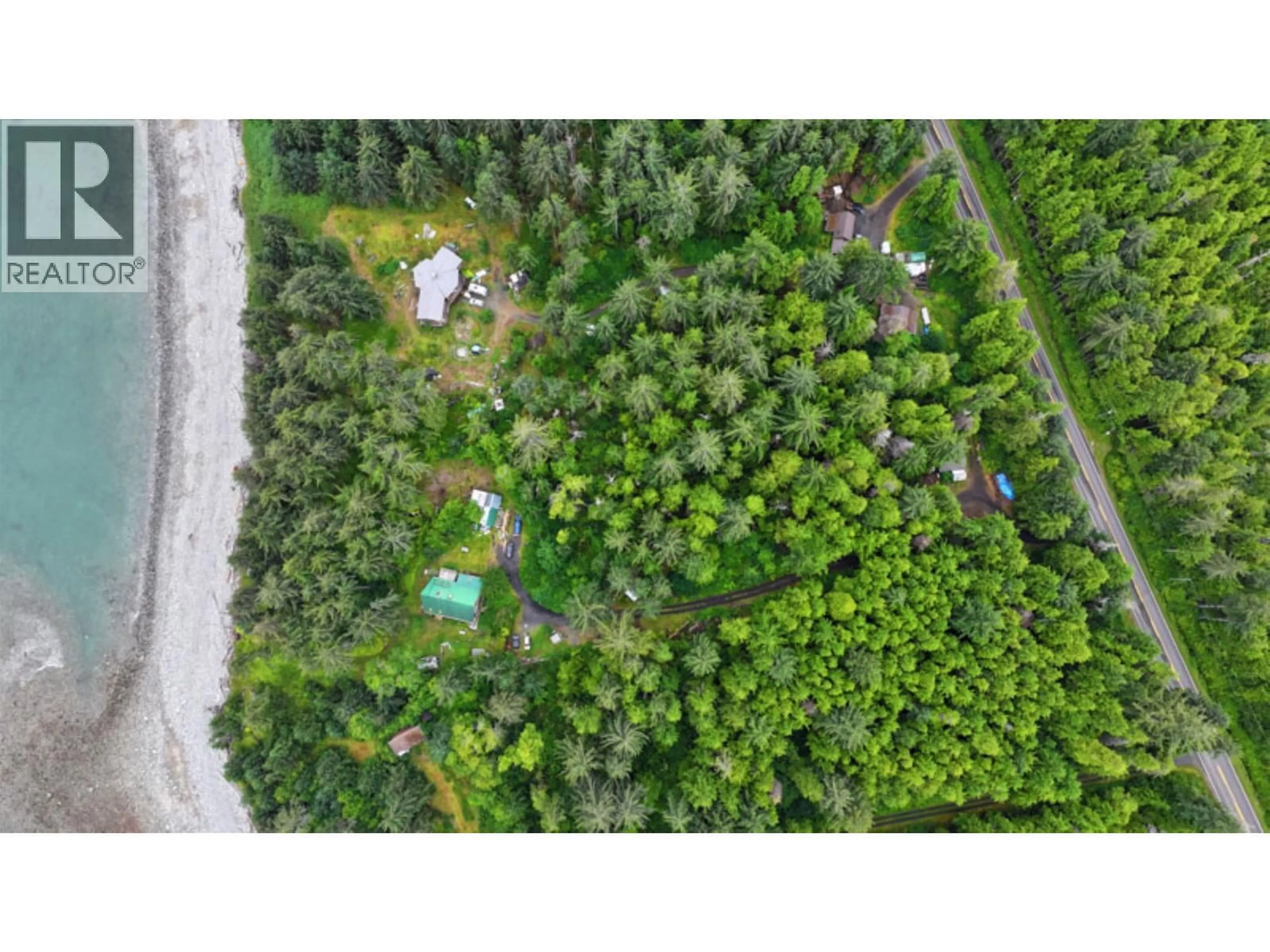 A pic from outside/outdoor area/front of a property/back of a property/a pic from drone, forest/trees view for 28809 16 HIGHWAY, Daajing Giids Rural British Columbia V0T1Y0
