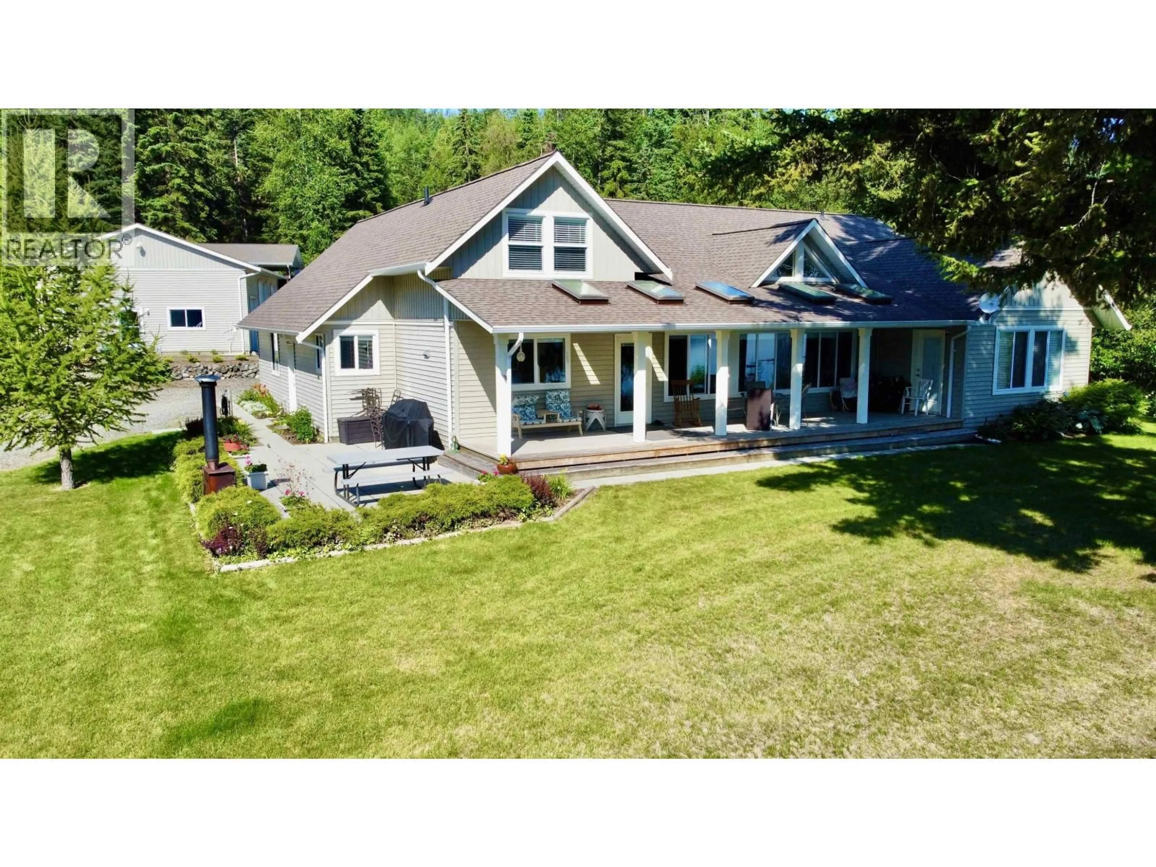 A pic from outside/outdoor area/front of a property/back of a property/a pic from drone, water/lake/river/ocean view for 4143 BLUEBIRD ROAD, Canim Lake British Columbia V0K1J0
