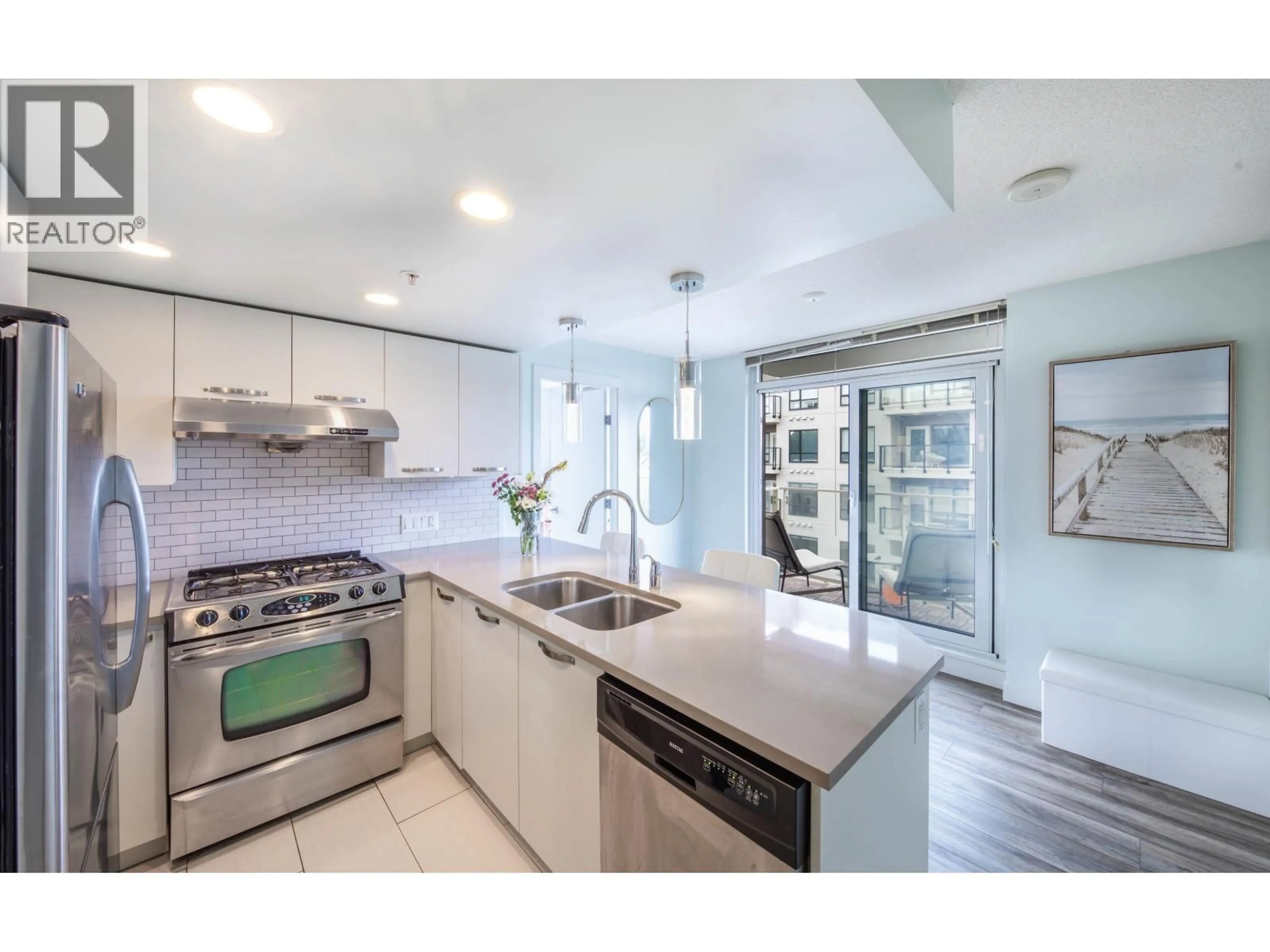 Open concept kitchen, ceramic/tile floor for 609 - 6888 COONEY ROAD, Richmond British Columbia V6Y0E1