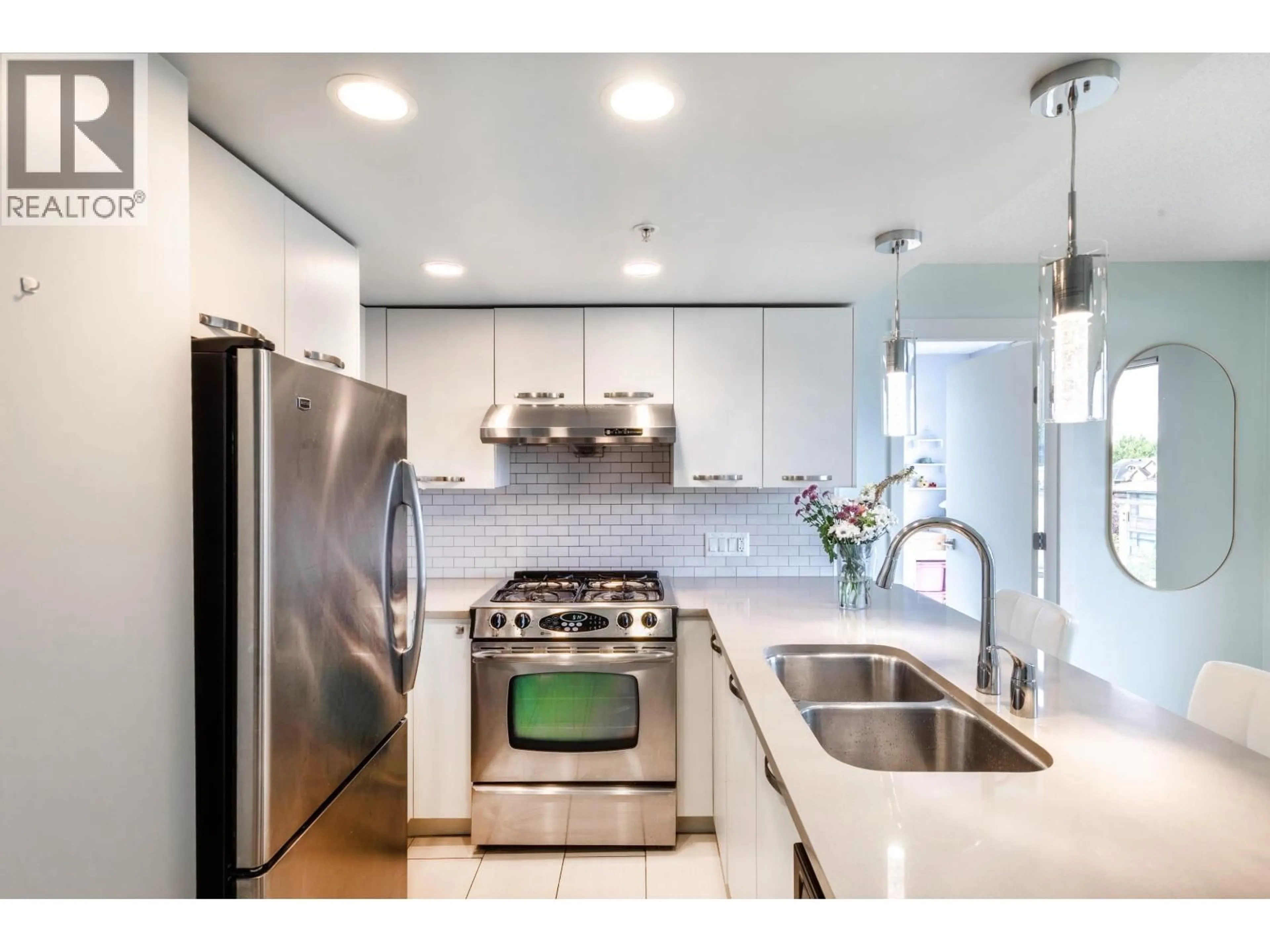 Contemporary kitchen, ceramic/tile floor for 609 - 6888 COONEY ROAD, Richmond British Columbia V6Y0E1