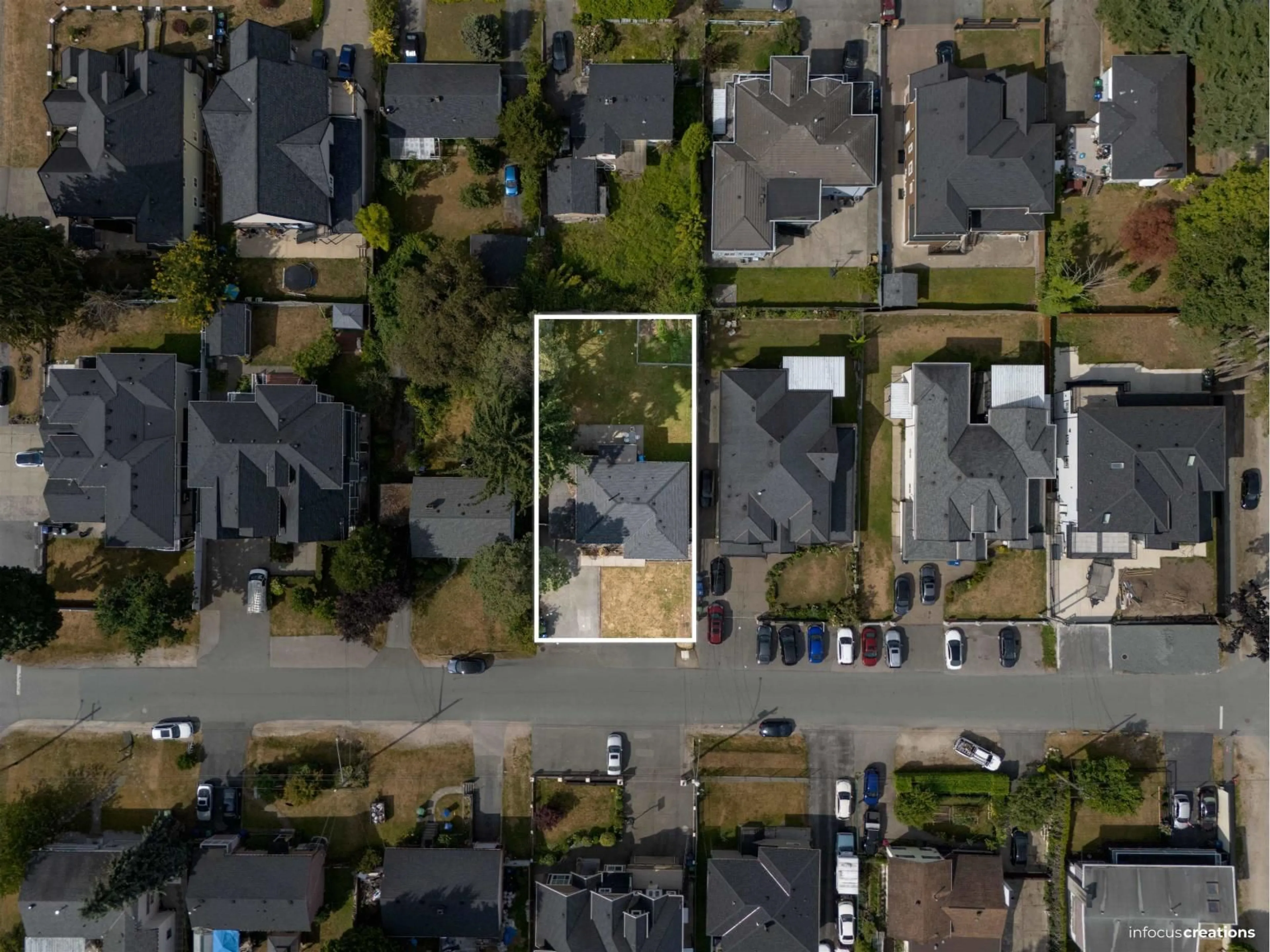 A pic from outside/outdoor area/front of a property/back of a property/a pic from drone, street for 12955 106A, Surrey British Columbia V3T2E3
