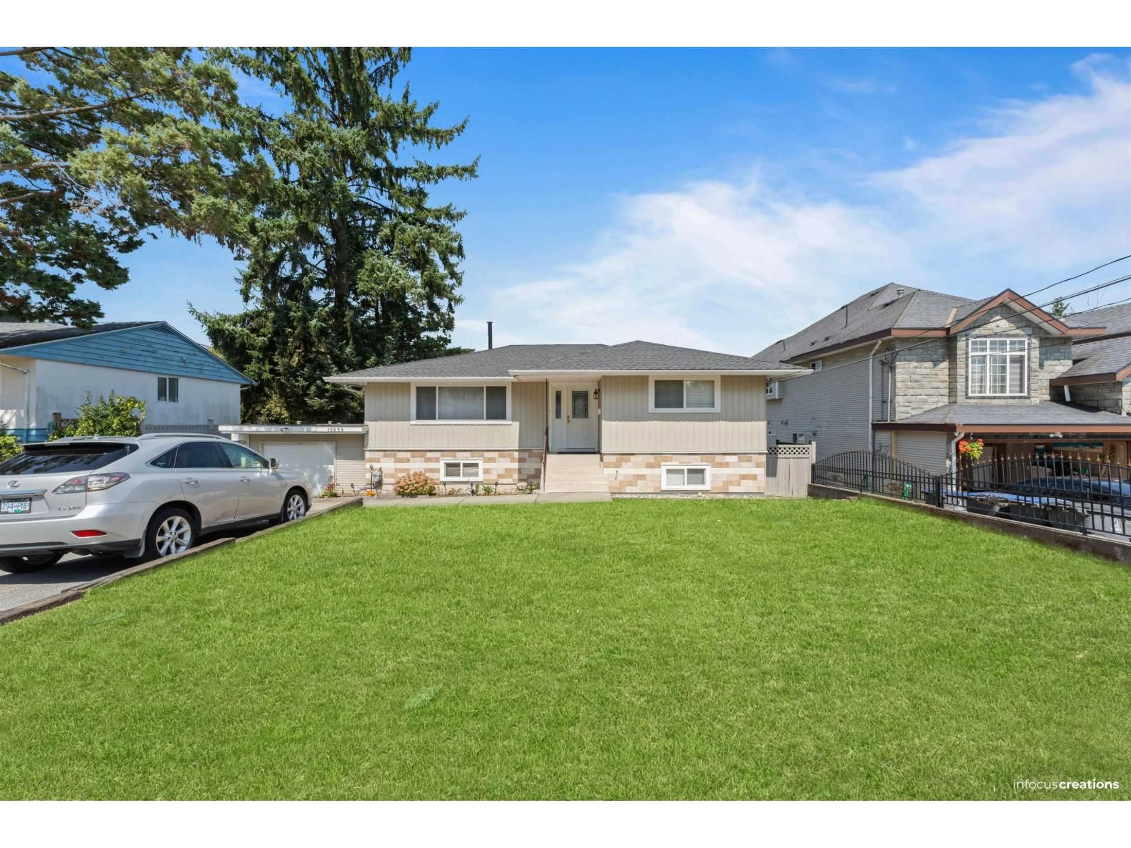 Home with vinyl exterior material, street for 12955 106A, Surrey British Columbia V3T2E3