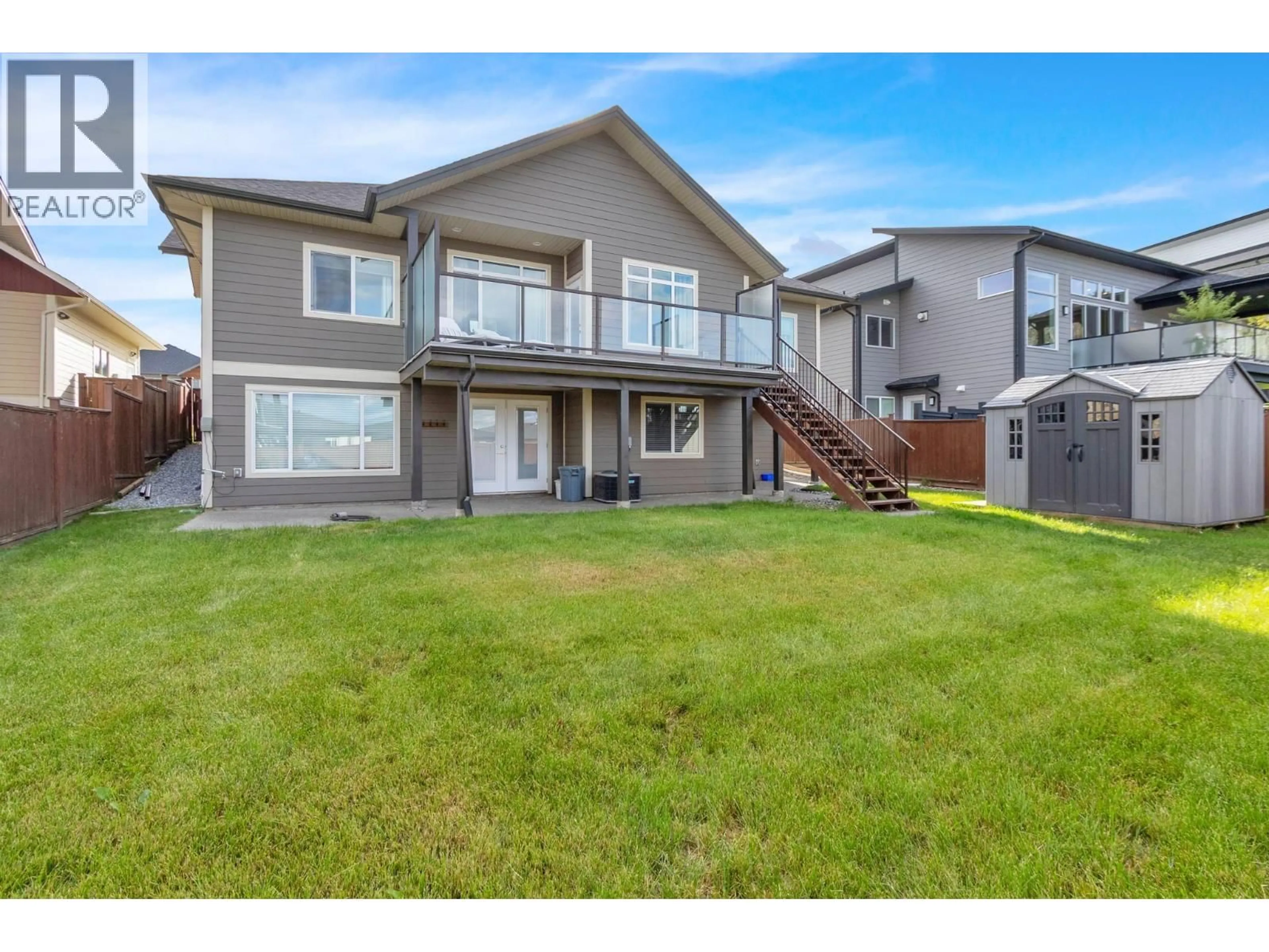 Home with vinyl exterior material, water/lake/river/ocean view for 2484 CHANCELLOR BOULEVARD, Prince George British Columbia V2N0E6
