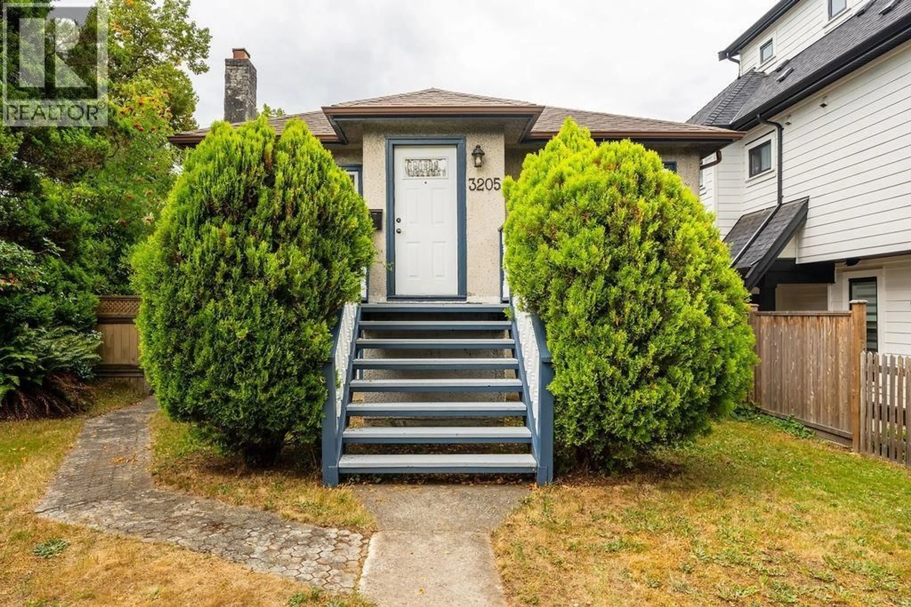 Home with vinyl exterior material, street for 3205 GEORGIA STREET, Vancouver British Columbia V5K2L2