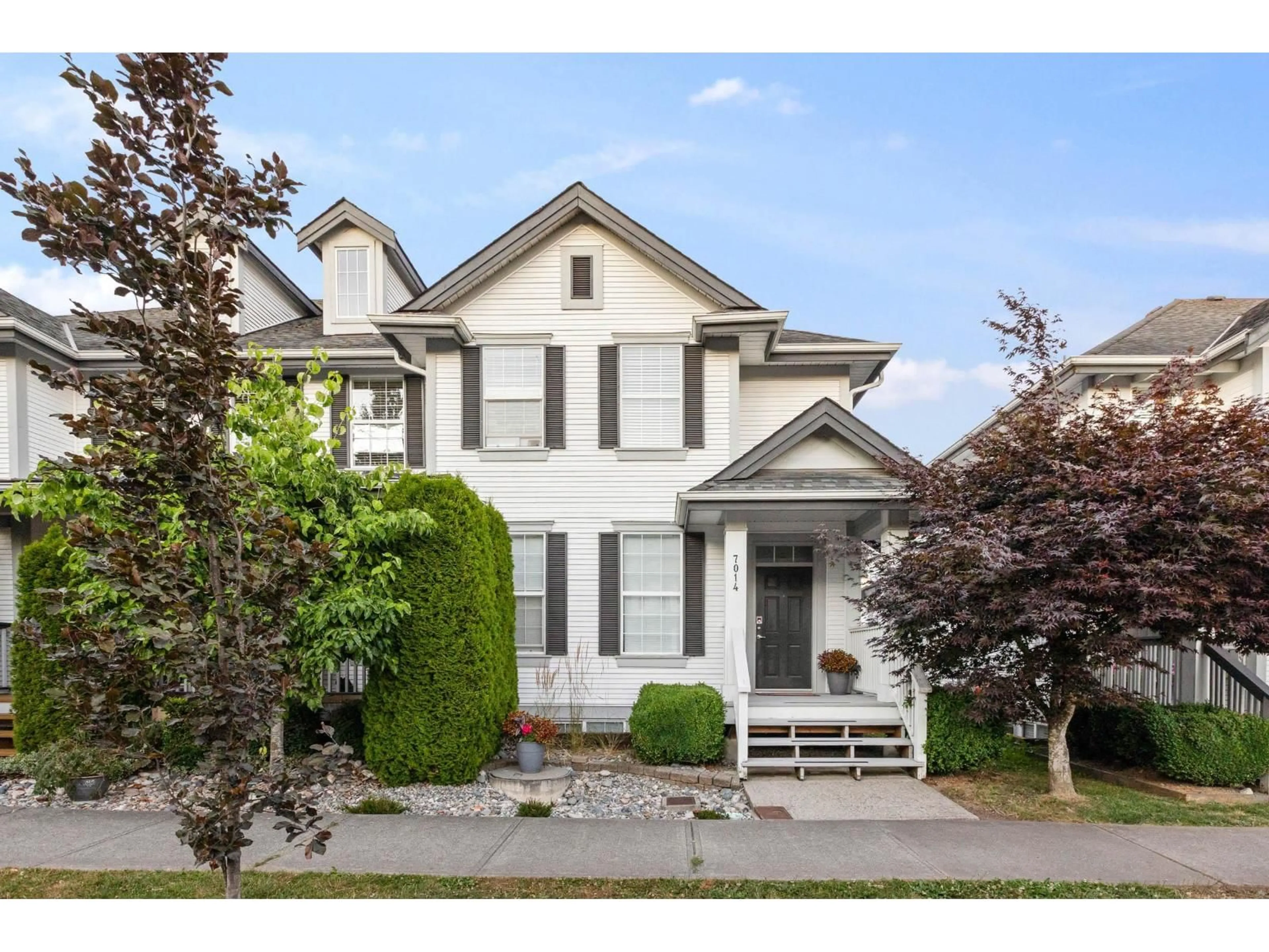 Home with vinyl exterior material, street for 7014 179A, Surrey British Columbia V3S7S4