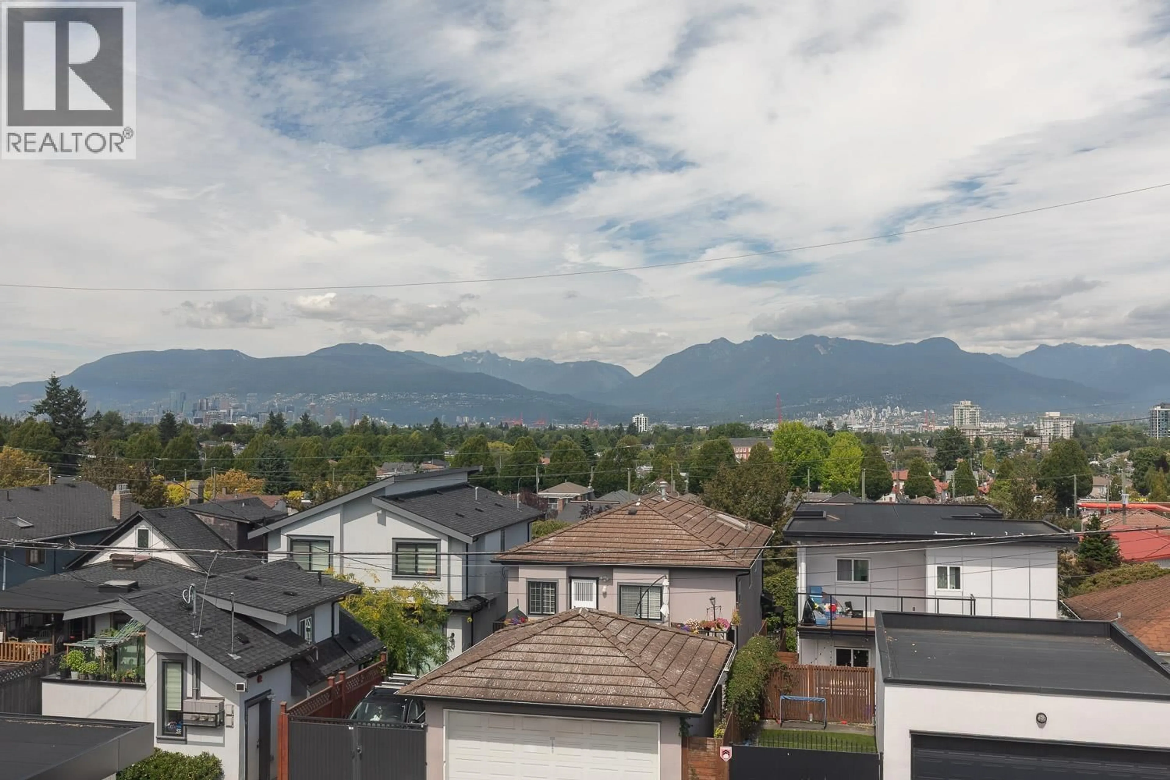 A pic from outside/outdoor area/front of a property/back of a property/a pic from drone, mountain view for 1365 36TH AVENUE, Vancouver British Columbia V5W1E1