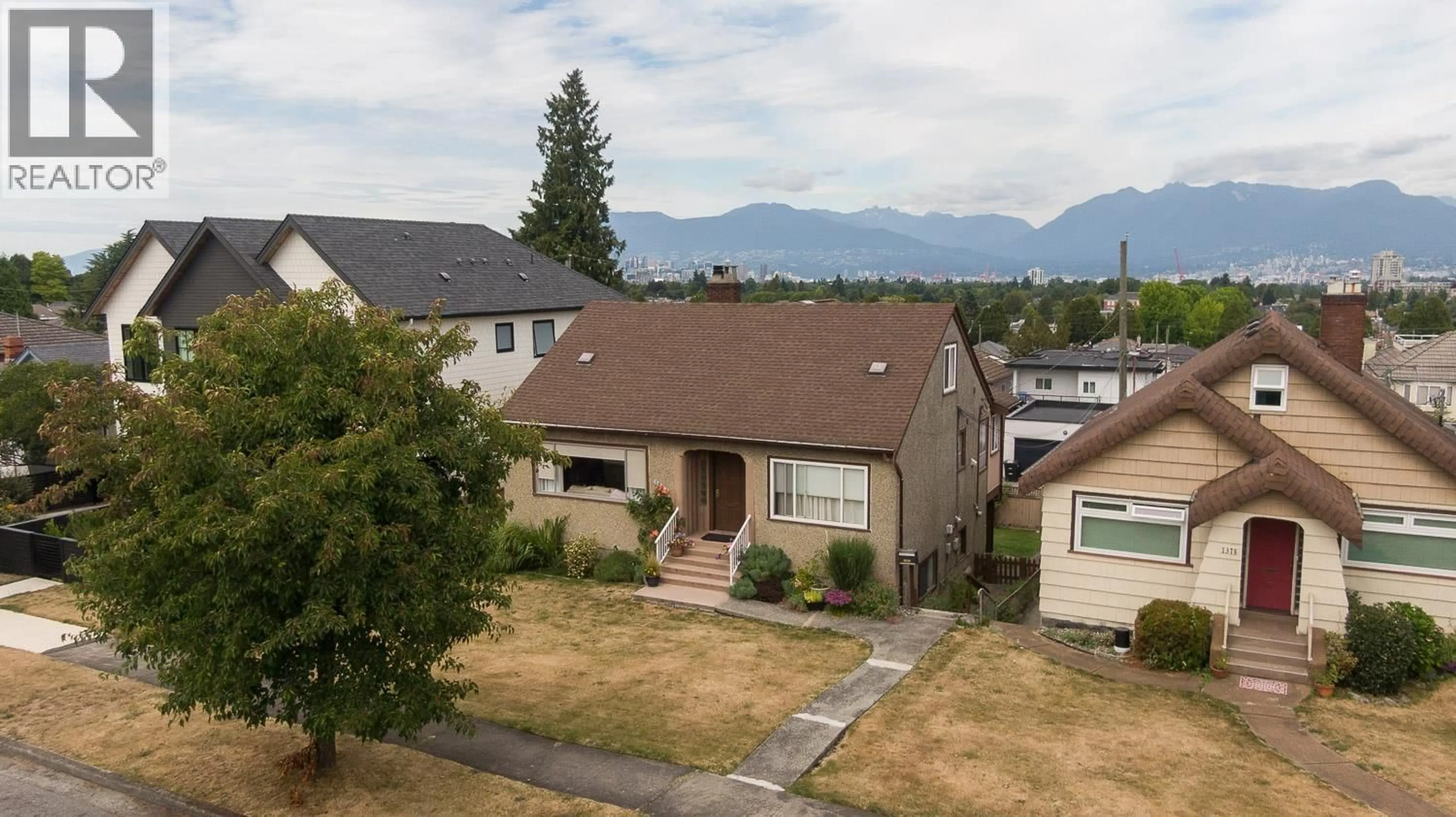 A pic from outside/outdoor area/front of a property/back of a property/a pic from drone, mountain view for 1365 36TH AVENUE, Vancouver British Columbia V5W1E1
