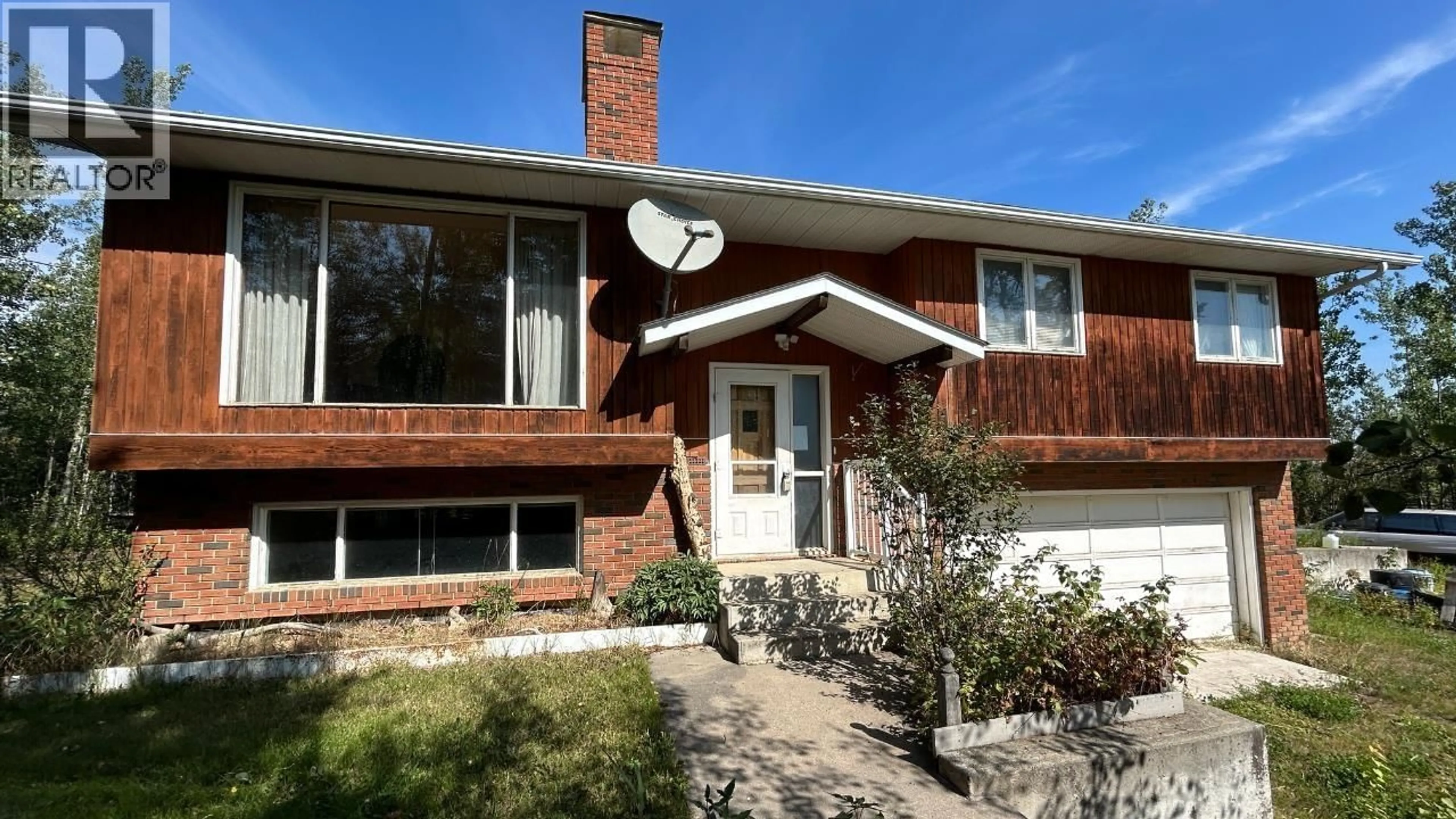 Home with brick exterior material, street for 11108 85 AVENUE, Fort St. John British Columbia V1J6V2