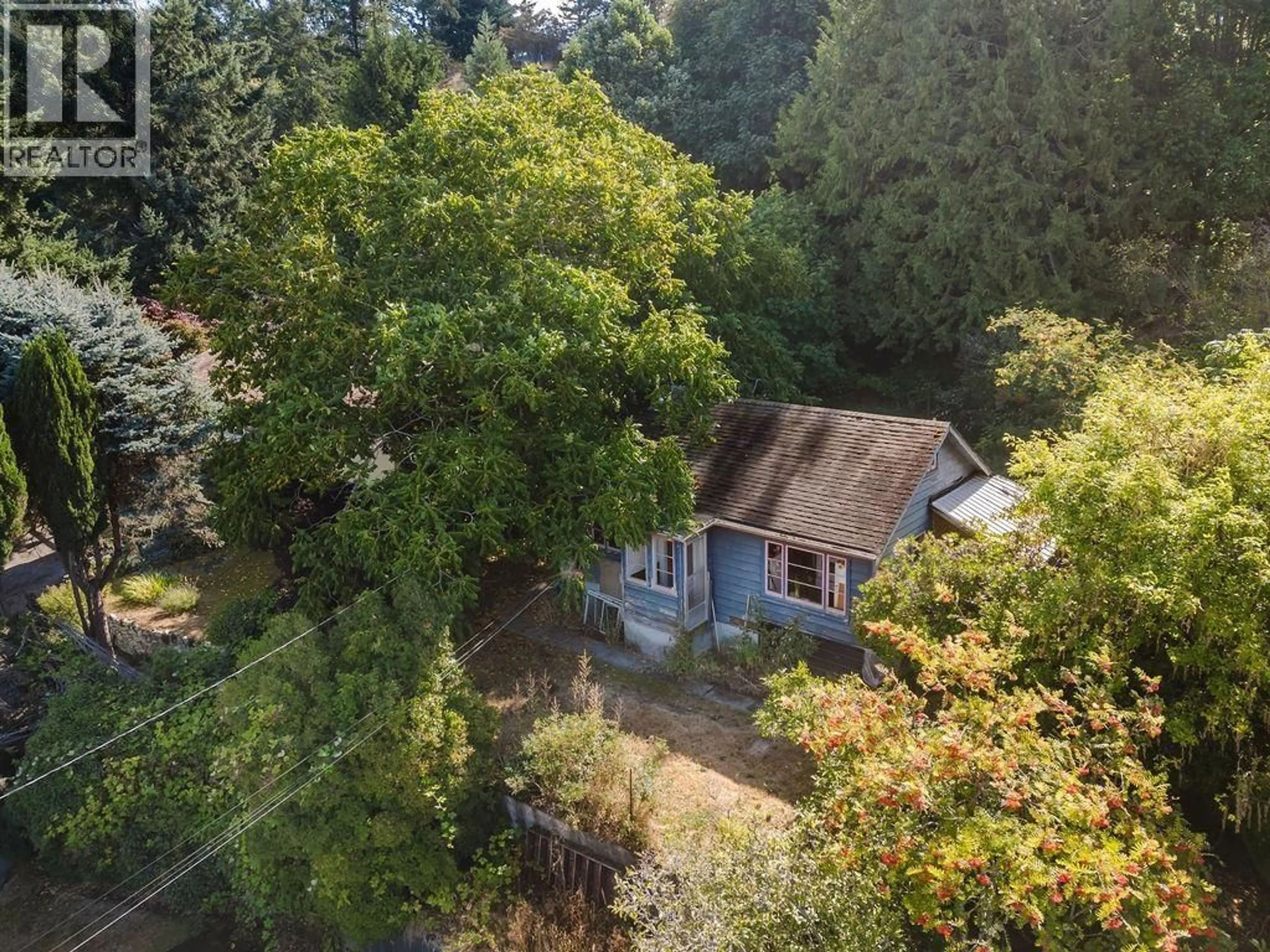 A pic from outside/outdoor area/front of a property/back of a property/a pic from drone, forest/trees view for 316 HEADLANDS ROAD, Gibsons British Columbia V0N1V8