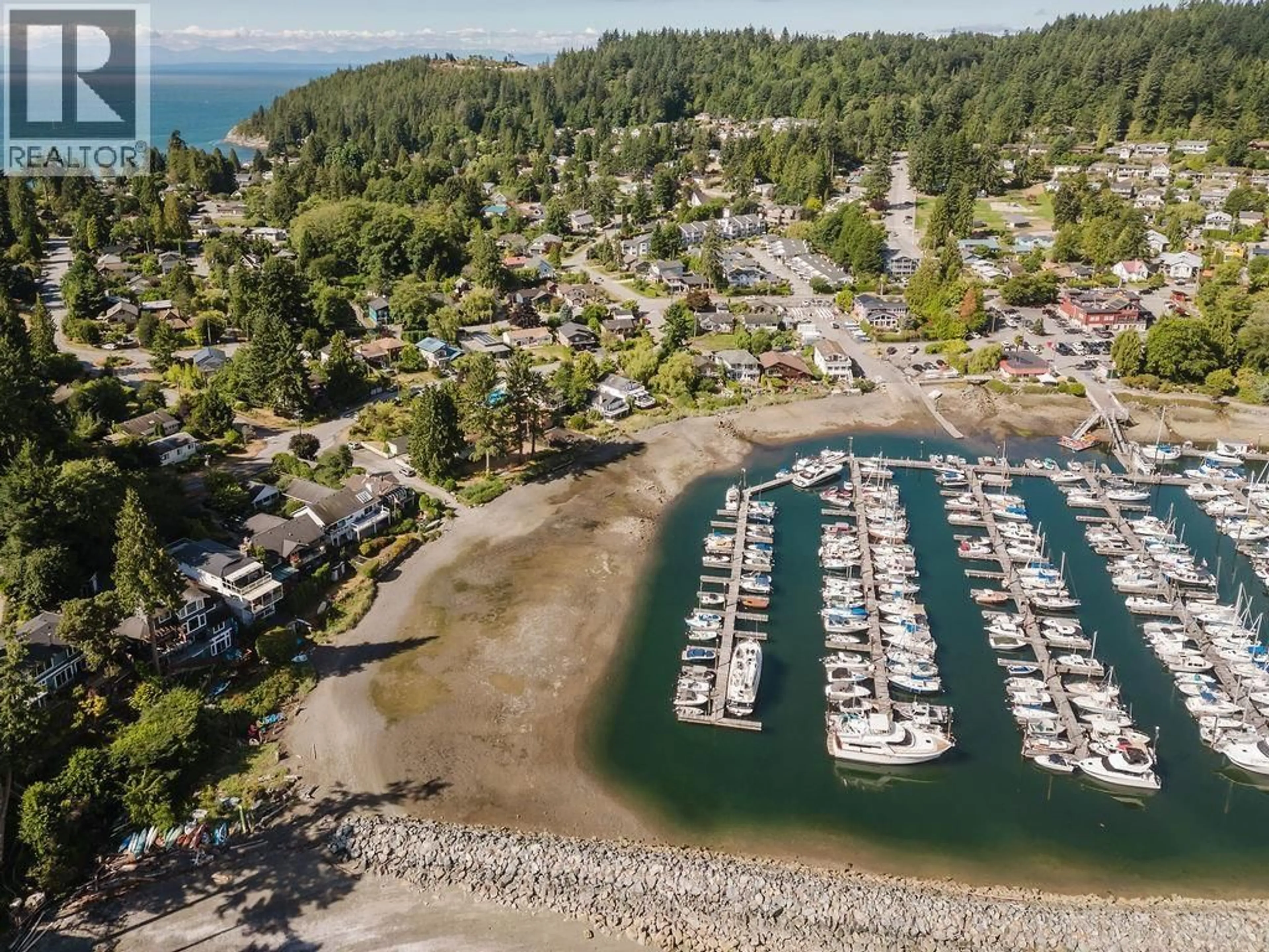 A pic from outside/outdoor area/front of a property/back of a property/a pic from drone, water/lake/river/ocean view for 316 HEADLANDS ROAD, Gibsons British Columbia V0N1V8