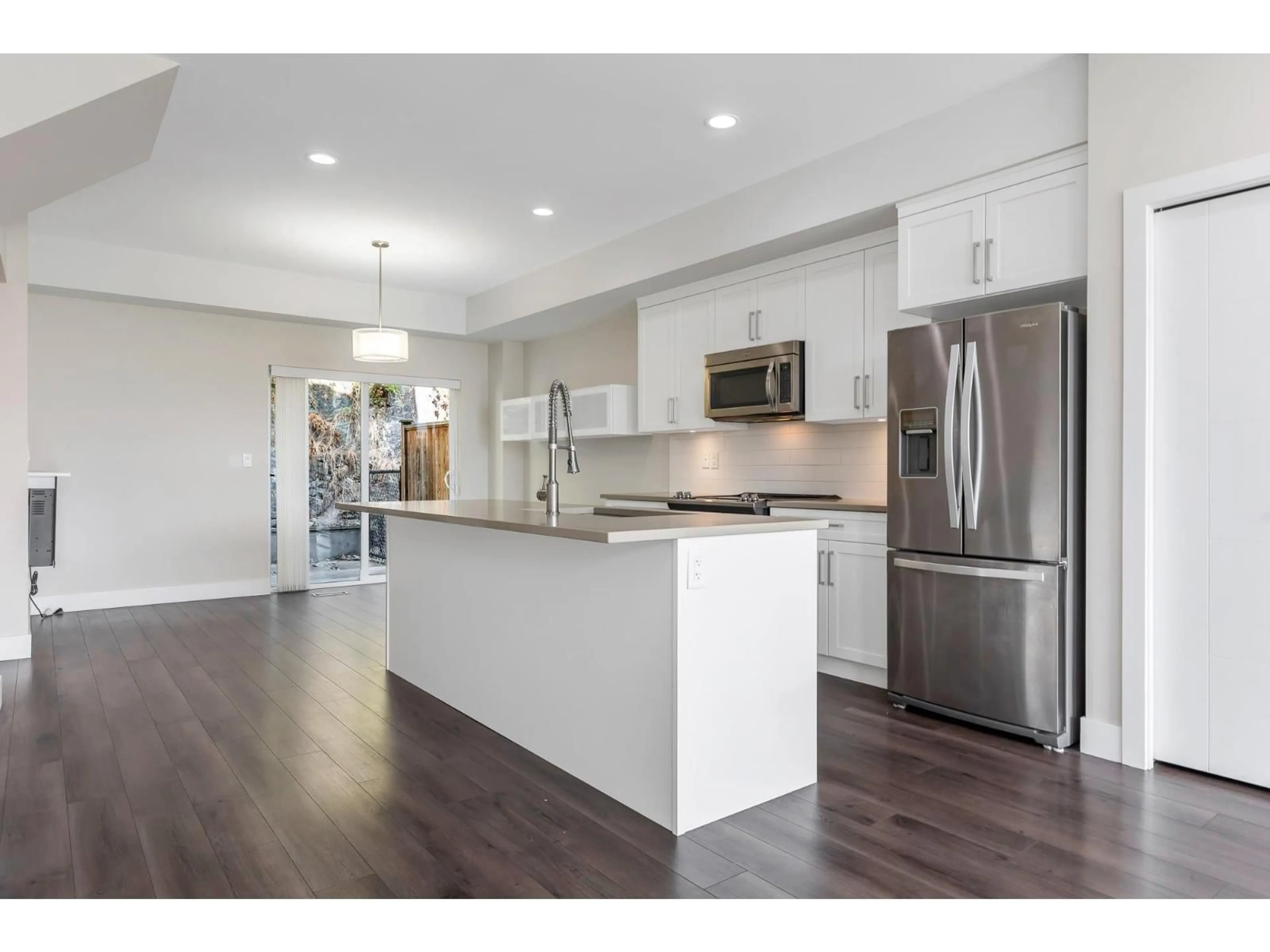 Open concept kitchen, wood/laminate floor for 12 - 36099 WATERLEAF, Abbotsford British Columbia V3G0G5