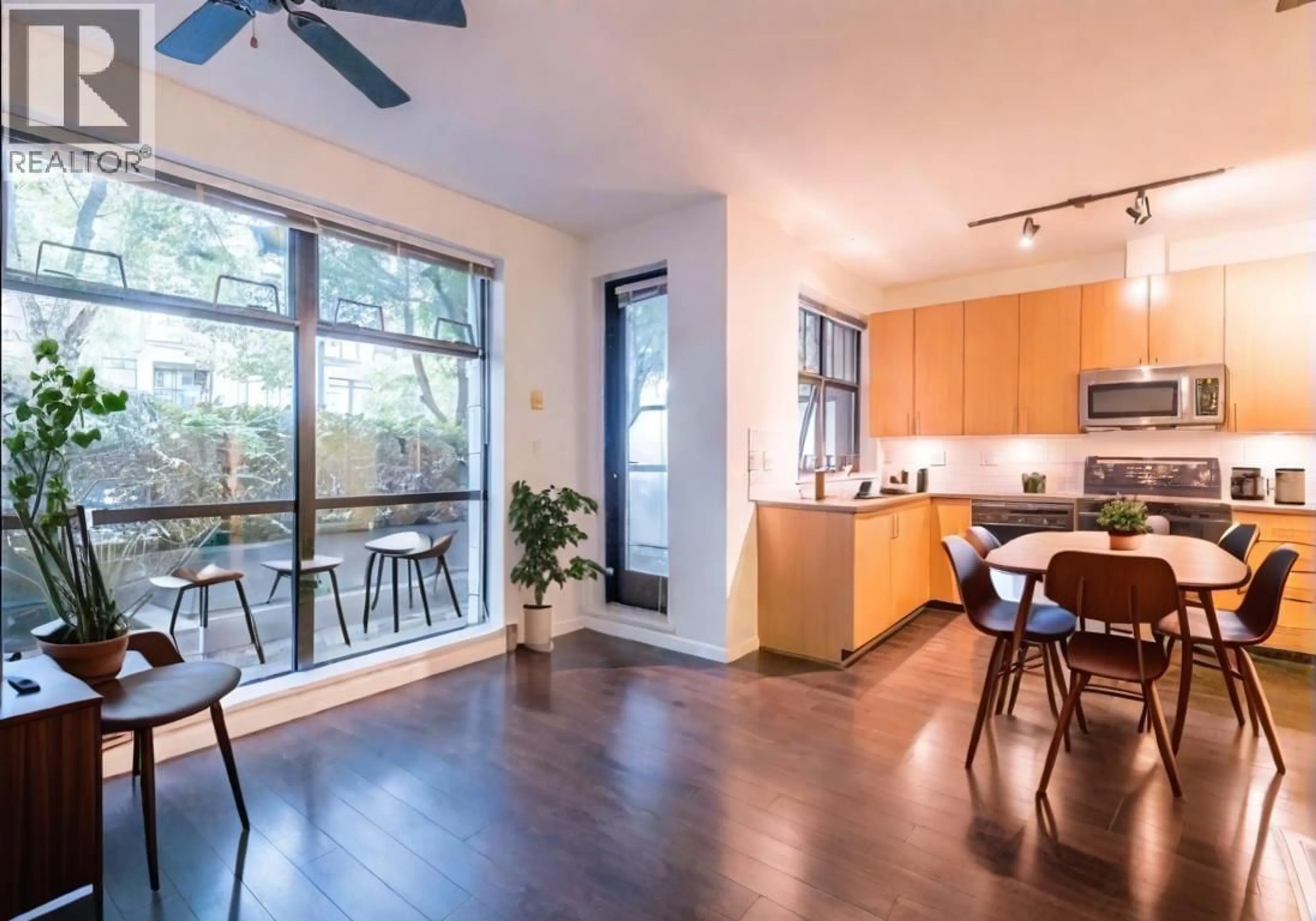 Open concept kitchen, wood/laminate floor for 101 - 2065 12TH AVENUE, Vancouver British Columbia V6J5L9