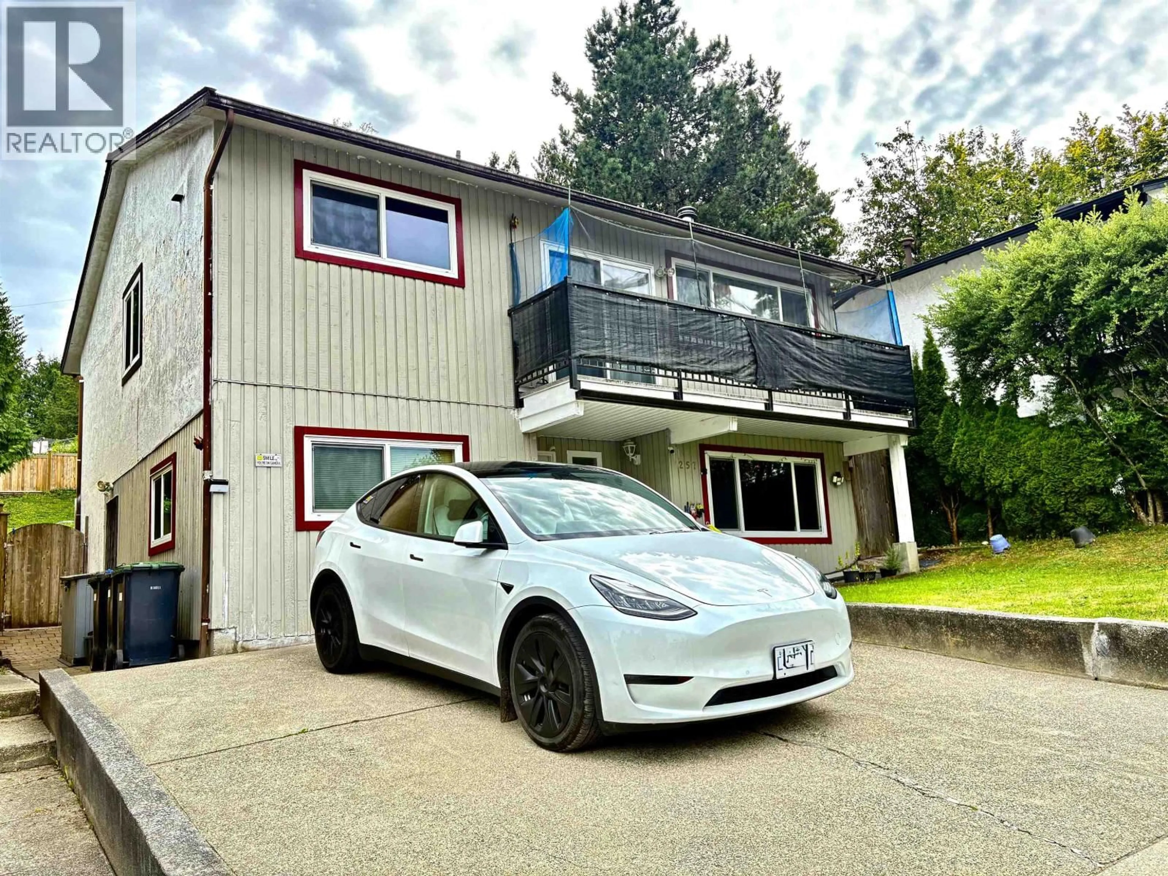 A pic from outside/outdoor area/front of a property/back of a property/a pic from drone, street for 257 ANGELA DRIVE, Port Moody British Columbia V3H3X7