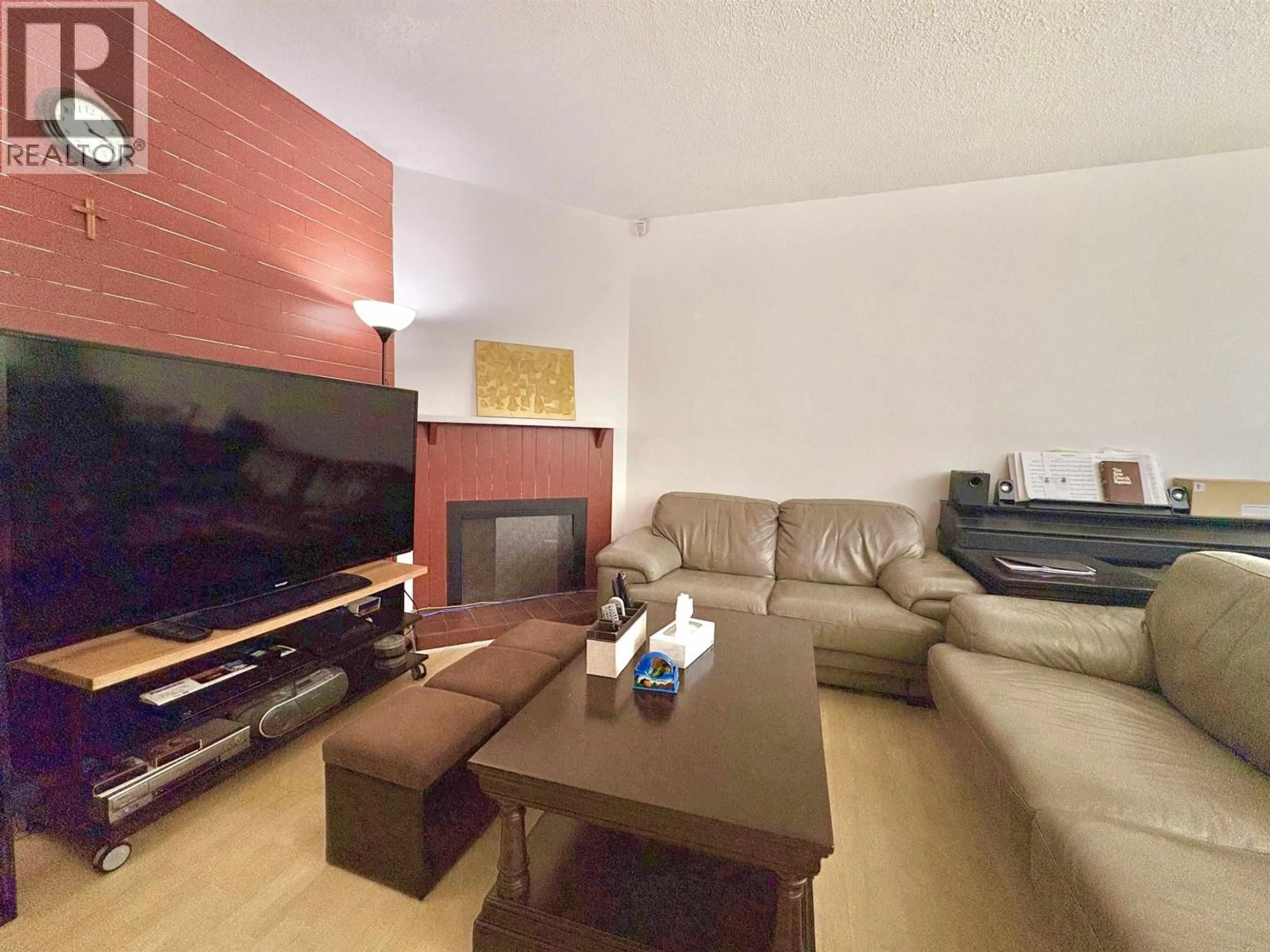 Living room with furniture, wood/laminate floor for 257 ANGELA DRIVE, Port Moody British Columbia V3H3X7