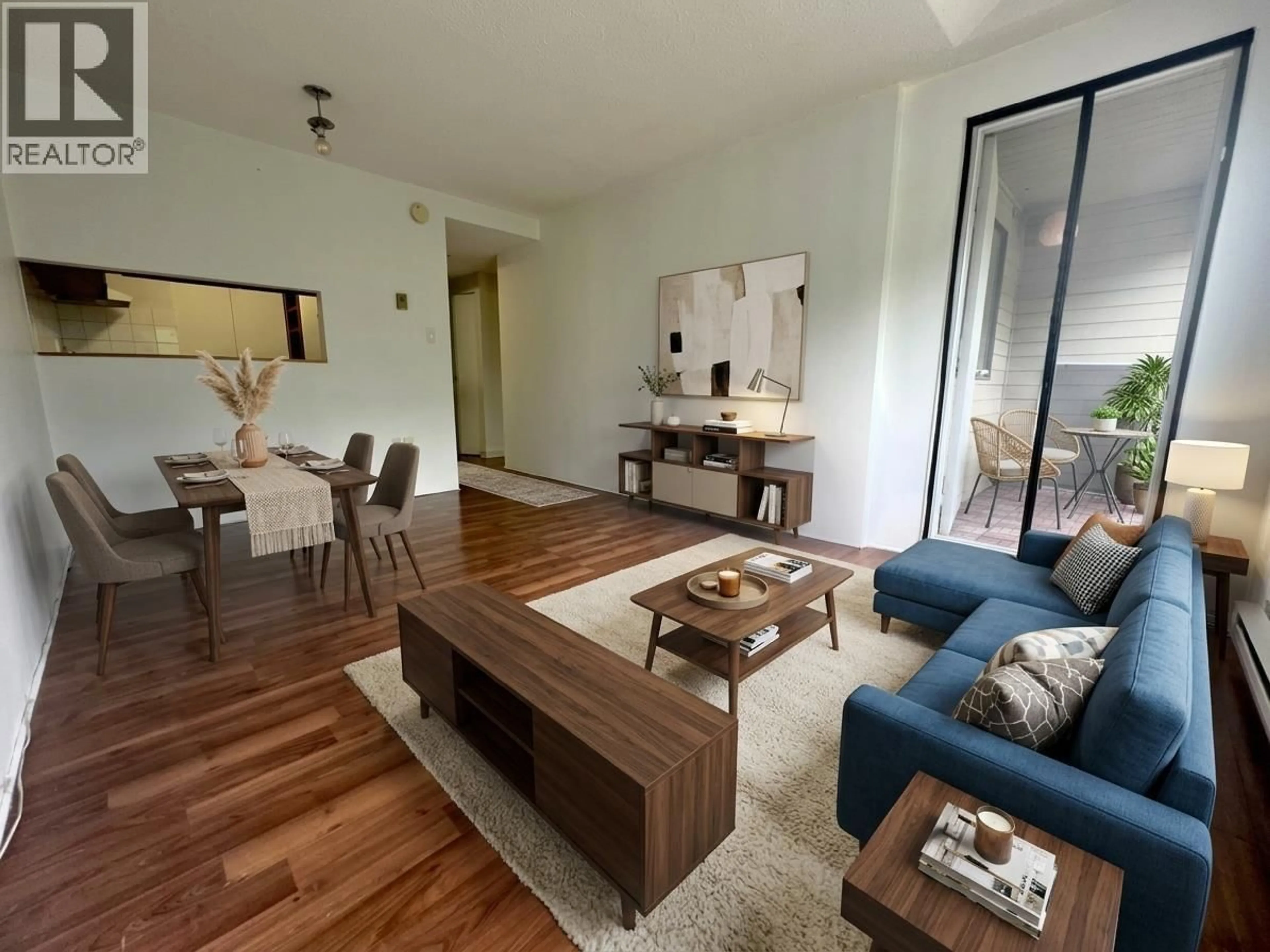 Living room with furniture, wood/laminate floor for 322 - 8120 COLONIAL DRIVE, Richmond British Columbia V7C4V2