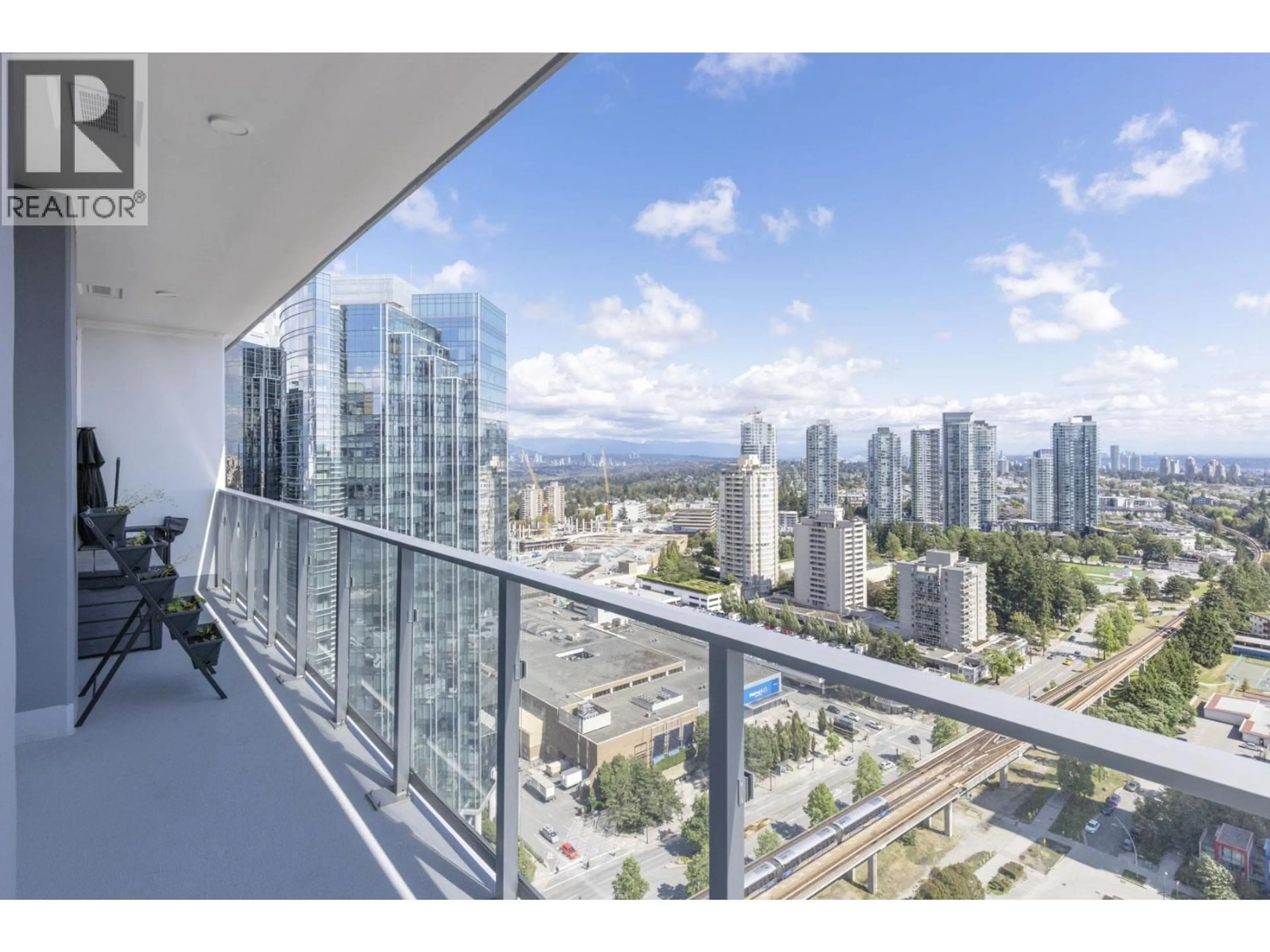 Balcony in the apartment, city buildings view from balcony for 2504 - 6511 SUSSEX AVENUE, Burnaby British Columbia V5H0K5