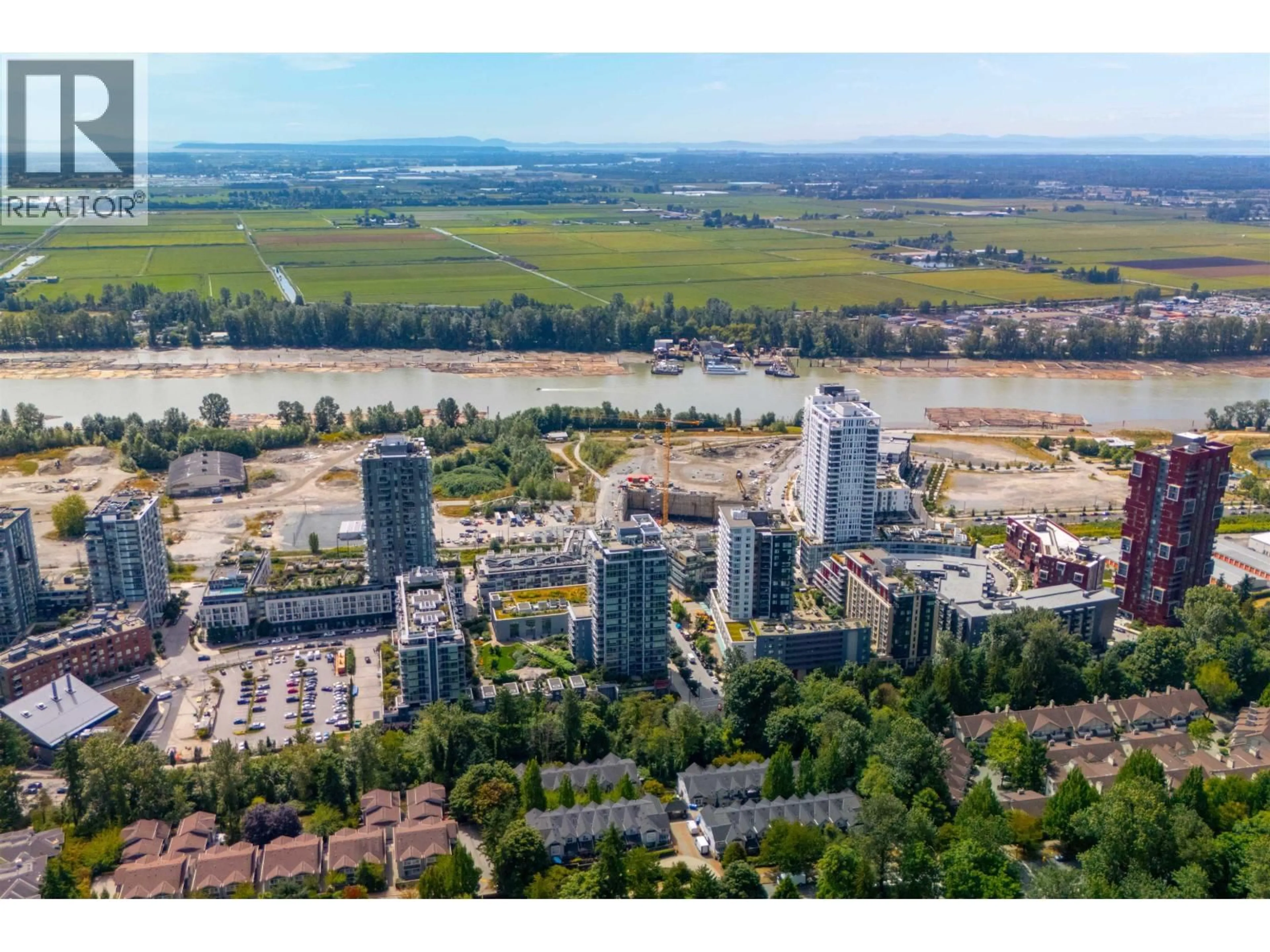 A pic from outside/outdoor area/front of a property/back of a property/a pic from drone, city buildings view from balcony for 507 - 8538 RIVER DISTRICT CROSSING, Vancouver British Columbia V5S0C9