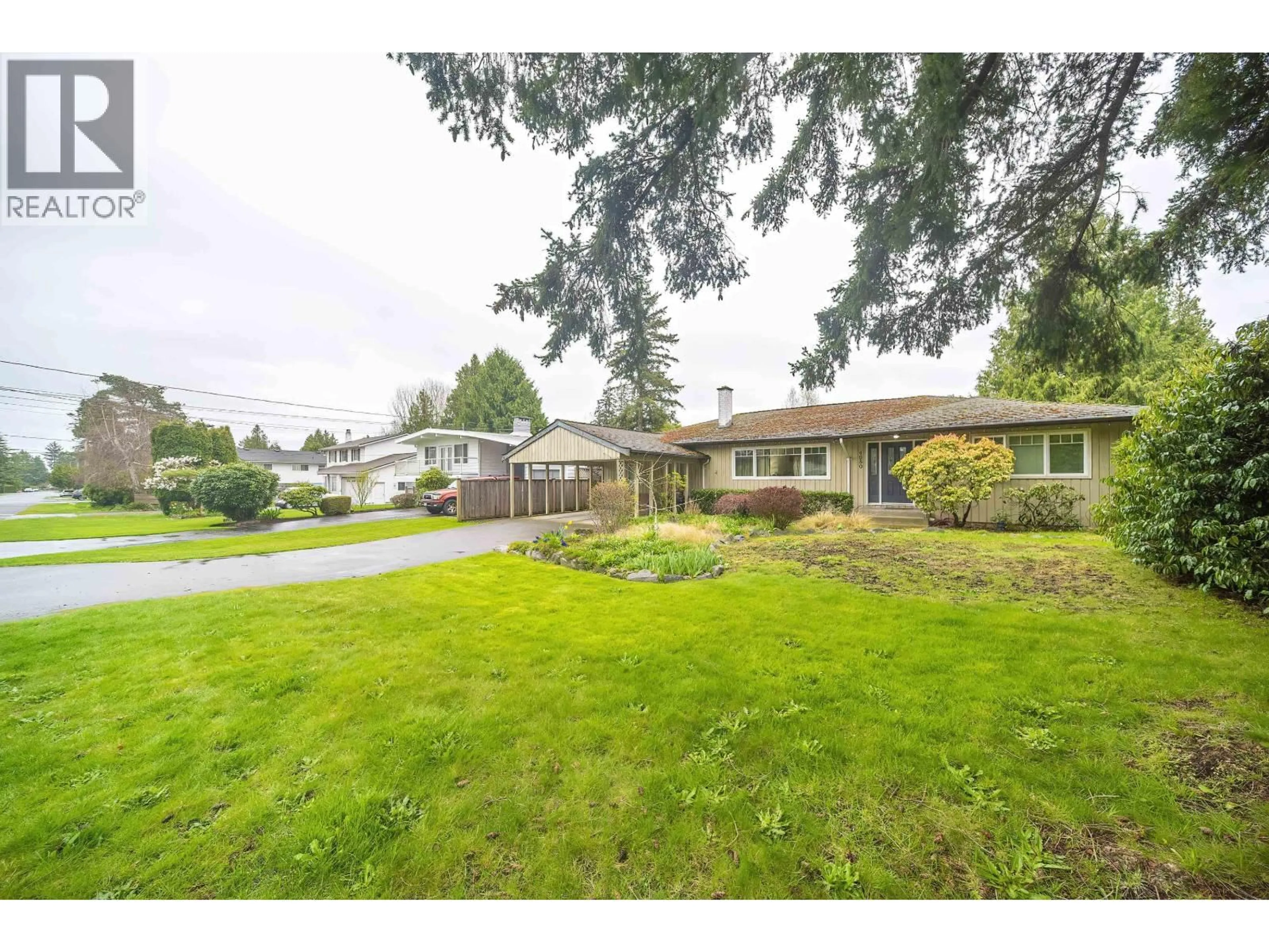 A pic from outside/outdoor area/front of a property/back of a property/a pic from drone, street for 4980 11A AVENUE, Delta British Columbia V4M1Z4