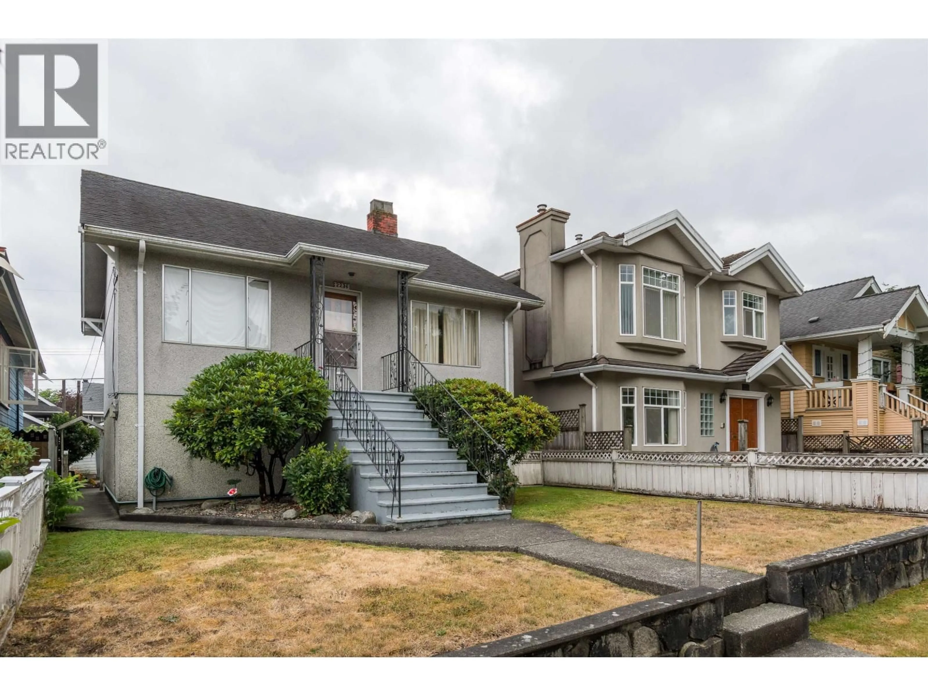 Home with vinyl exterior material, street for 2236 KITCHENER STREET, Vancouver British Columbia V5L2X2