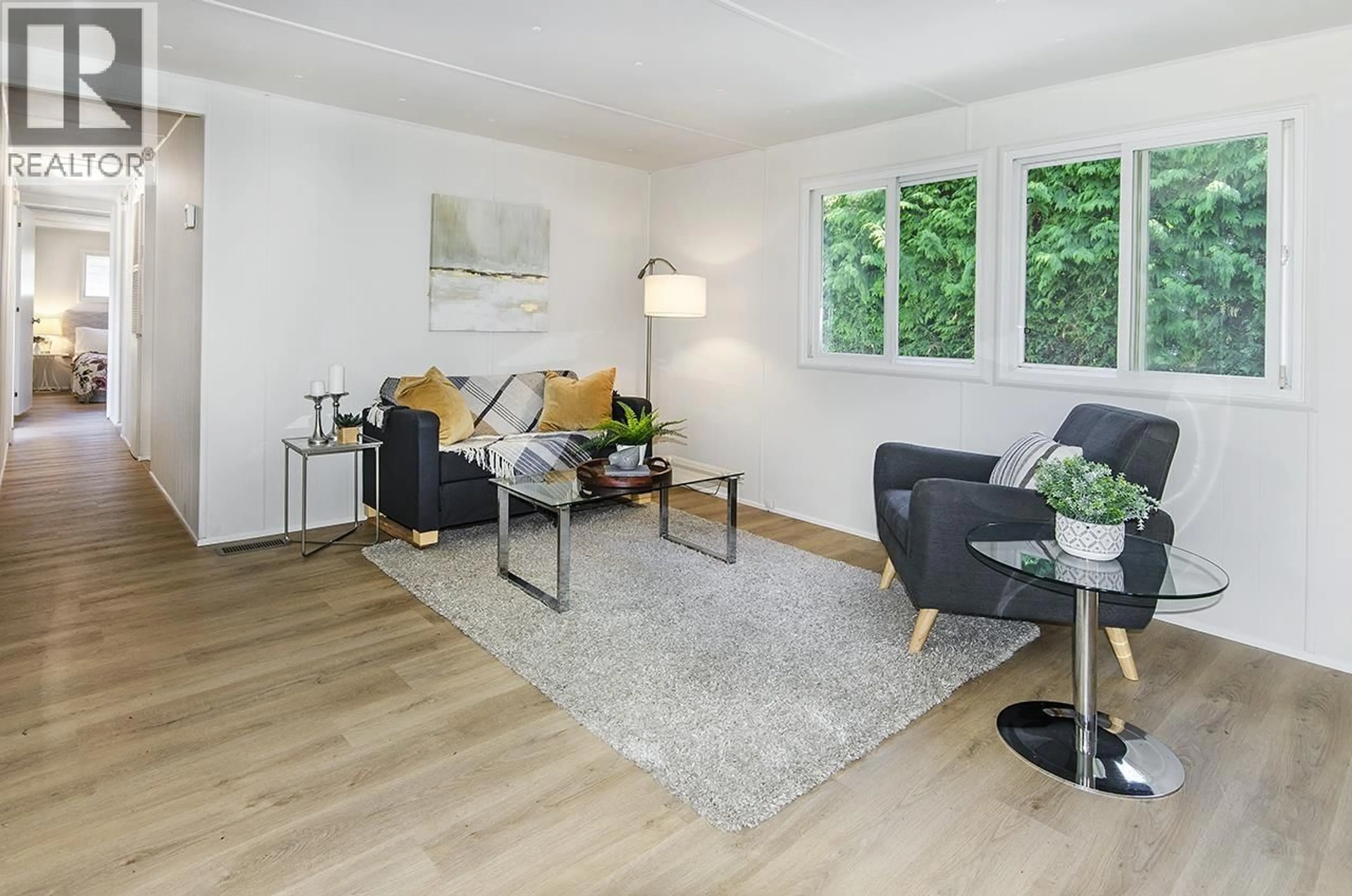 Living room with furniture, wood/laminate floor for 422 RAINDANCE CRESCENT, West Vancouver British Columbia V7P1C2