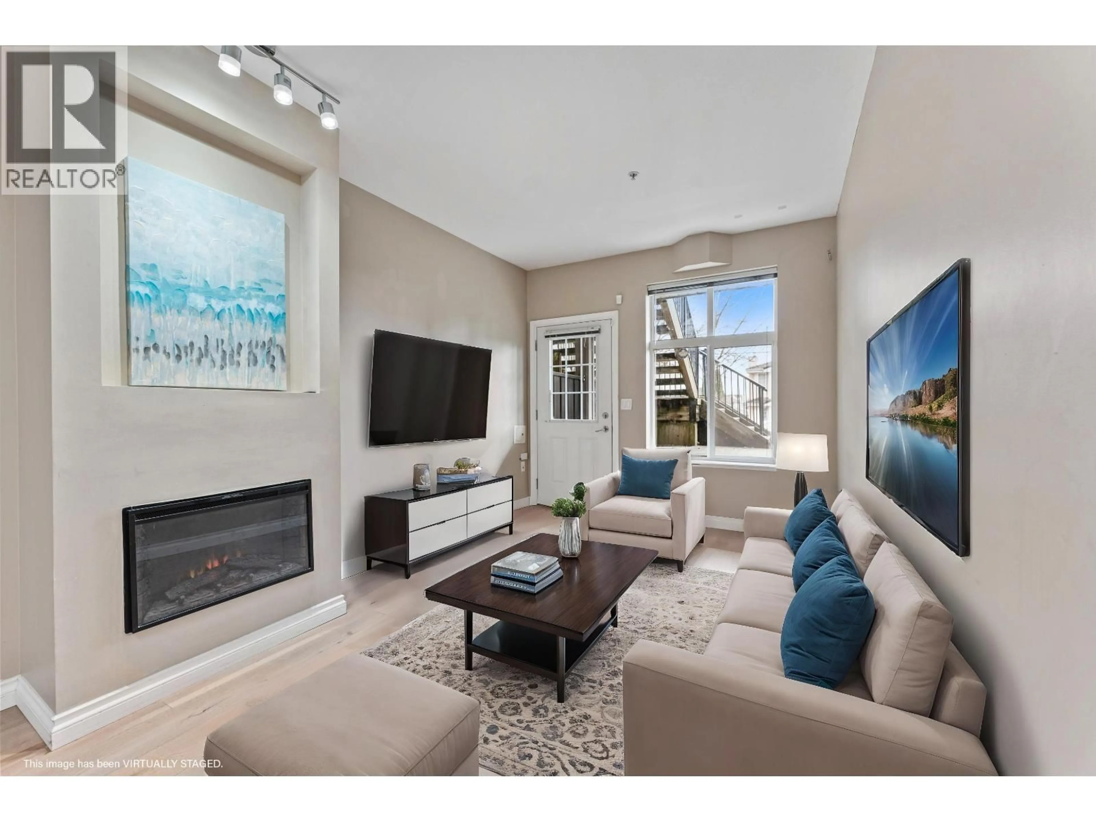 Living room with furniture, unknown for 121 - 7333 16TH AVENUE, Burnaby British Columbia V3N0A8
