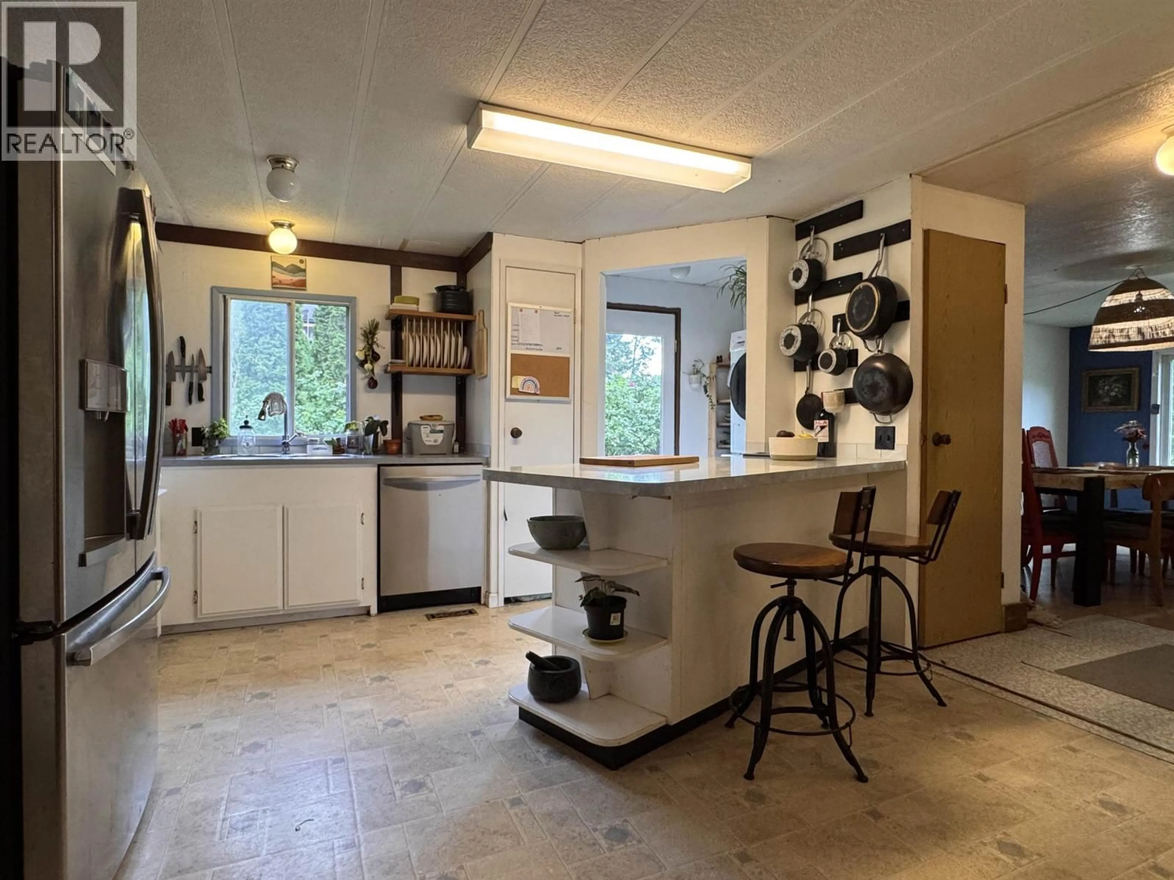 Kitchen with laundary machines, unknown for 2914 THORNHILL STREET, Terrace British Columbia V8G4Z7