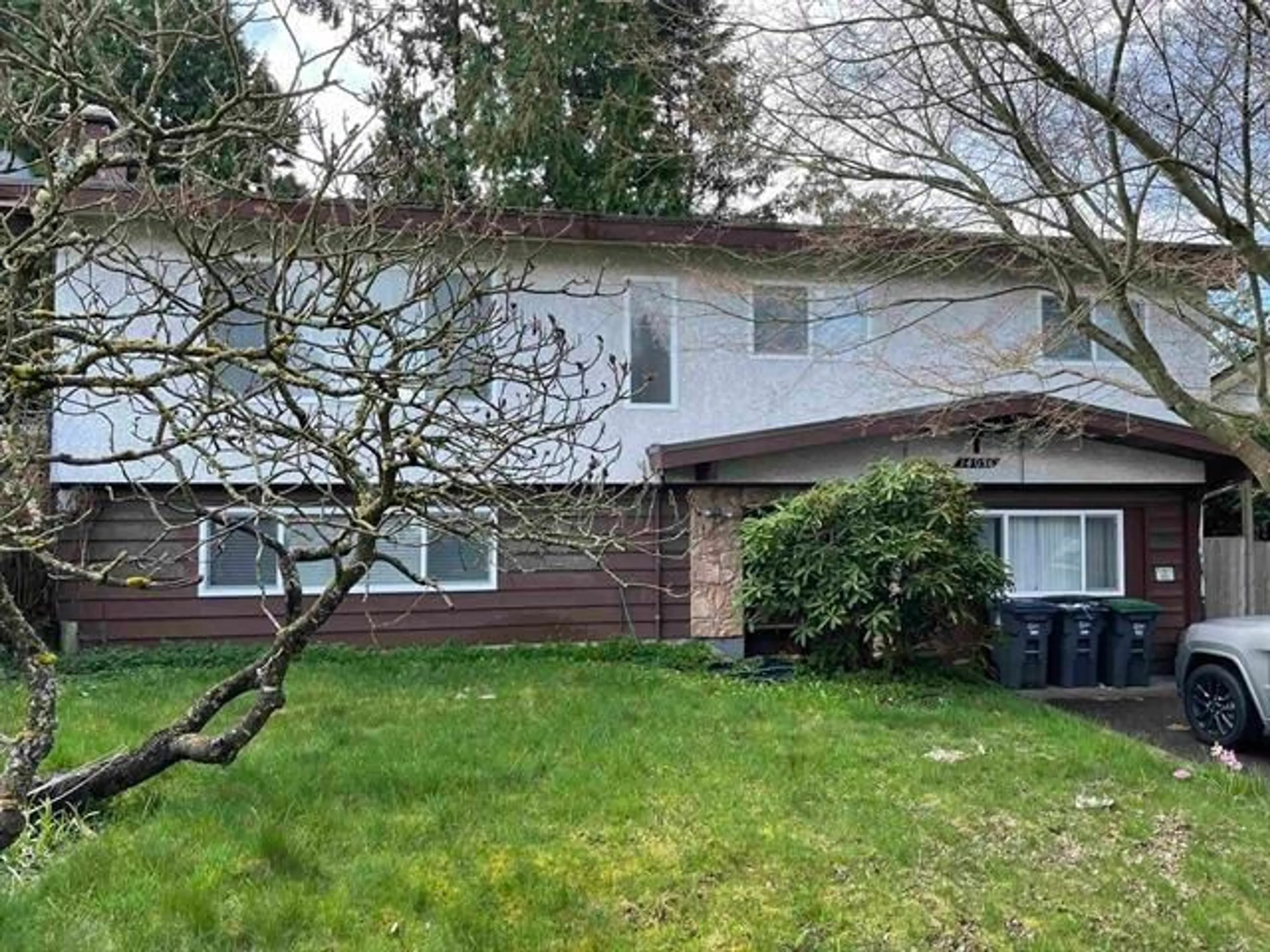 Home with vinyl exterior material, street for 14036 102A, Surrey British Columbia V3T1P9
