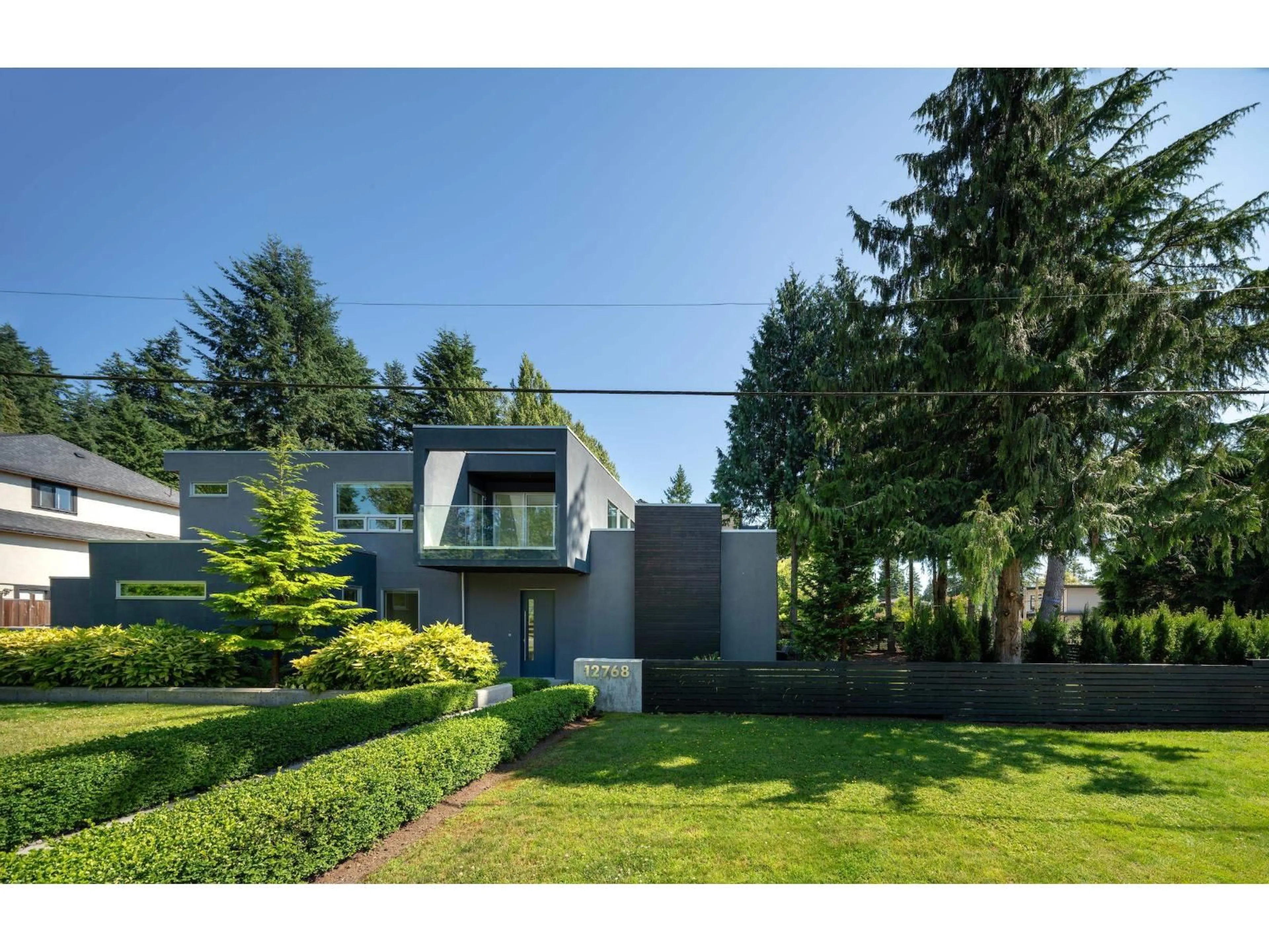 A pic from outside/outdoor area/front of a property/back of a property/a pic from drone, street for 12768 26B, Surrey British Columbia V4A3T3