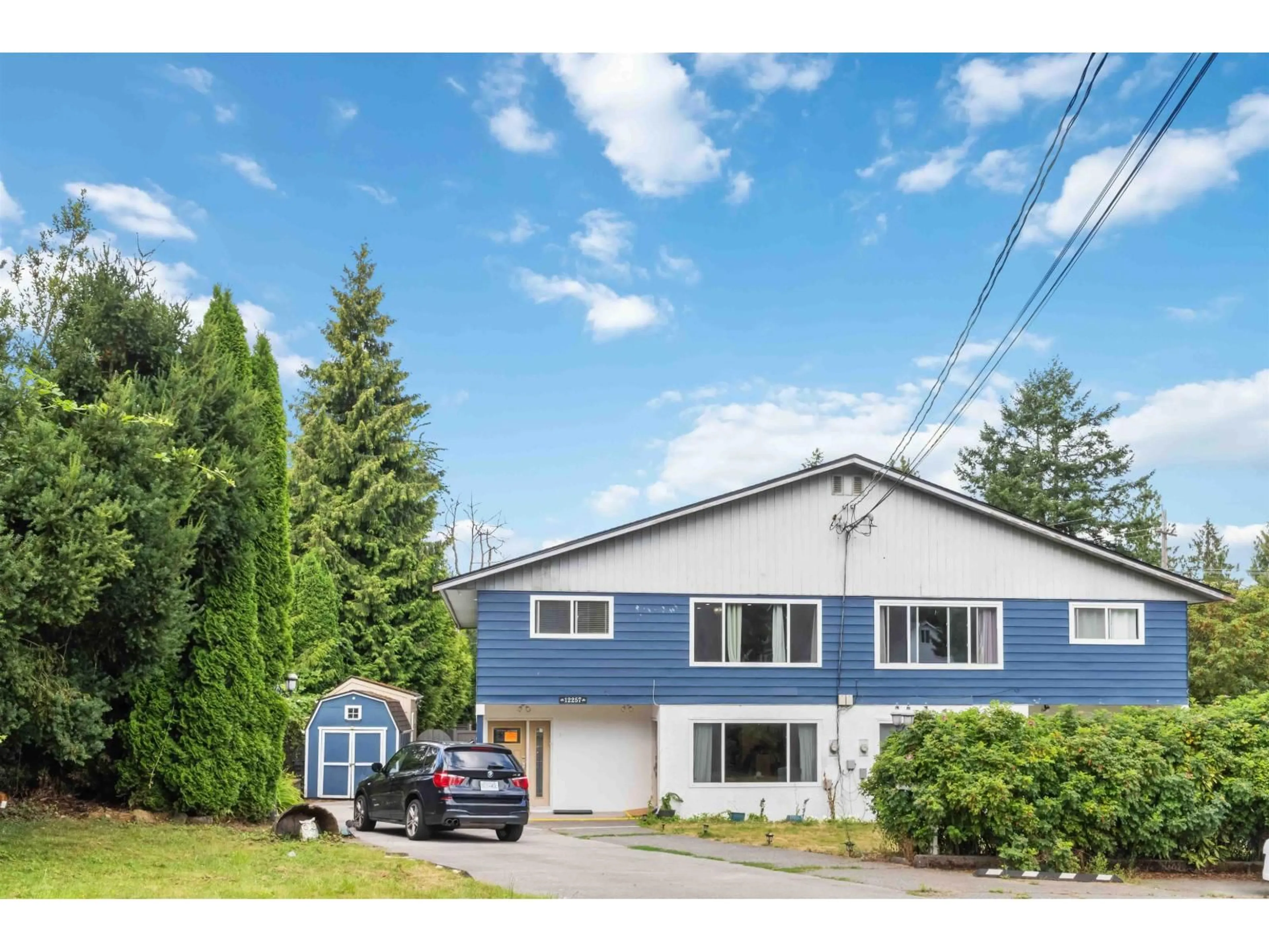 Home with vinyl exterior material, street for 12257 101, Surrey British Columbia V3V2Z4