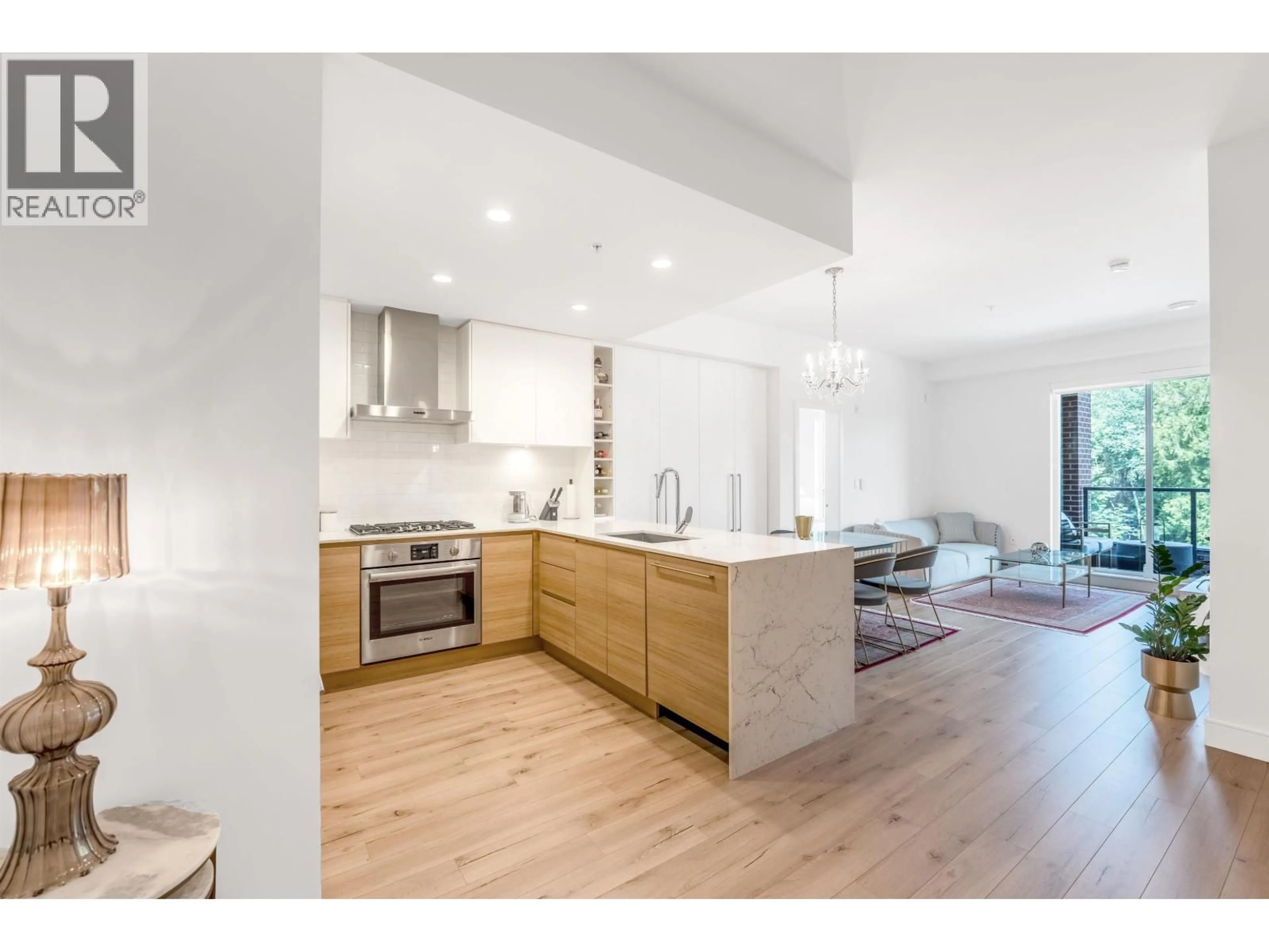 Open concept kitchen, wood/laminate floor for 319 - 55 KLAHANIE DRIVE, Port Moody British Columbia V3H0M9