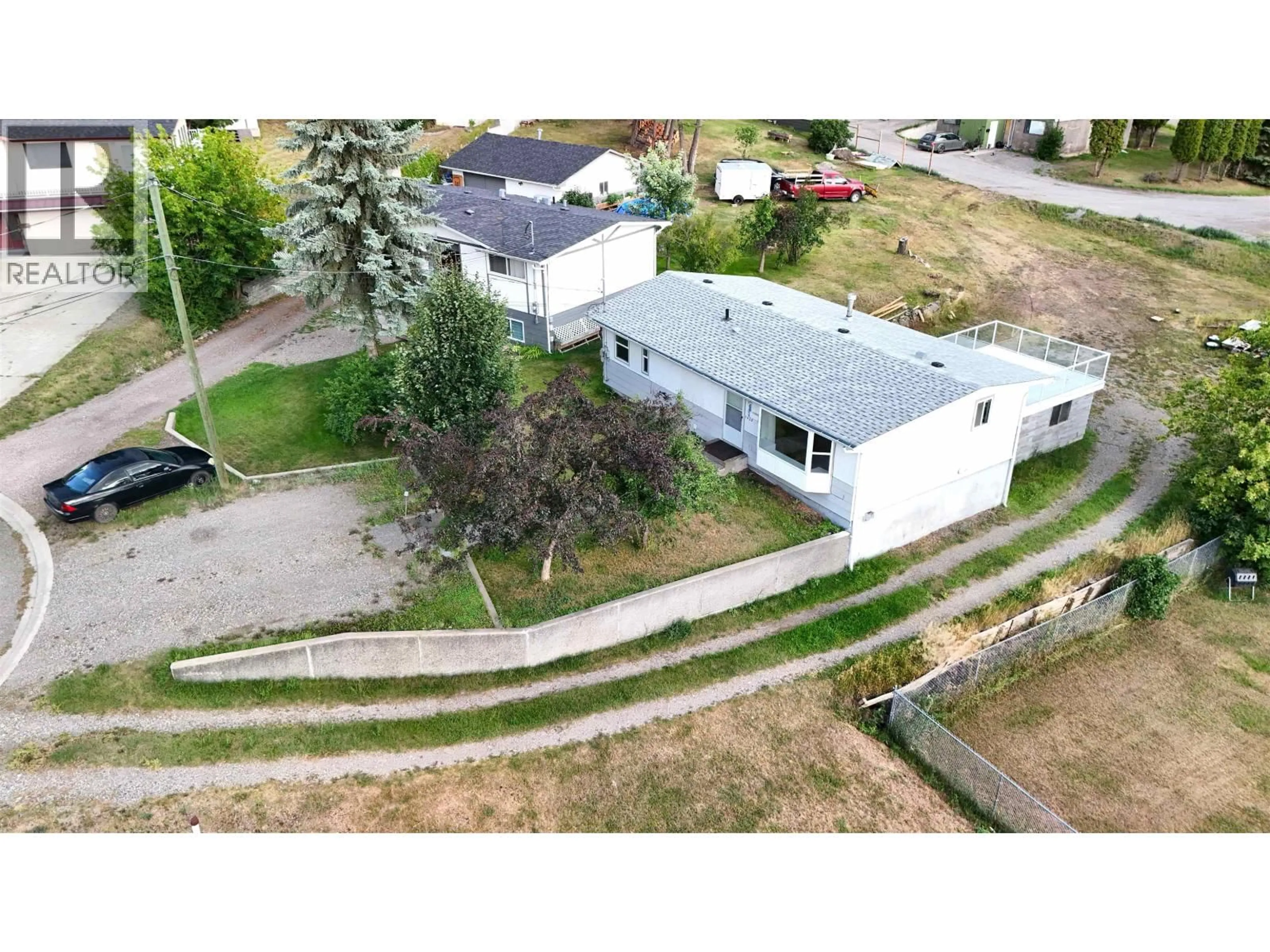 A pic from outside/outdoor area/front of a property/back of a property/a pic from drone, street for 1025 CURTIS PLACE, Williams Lake British Columbia V2G4B3